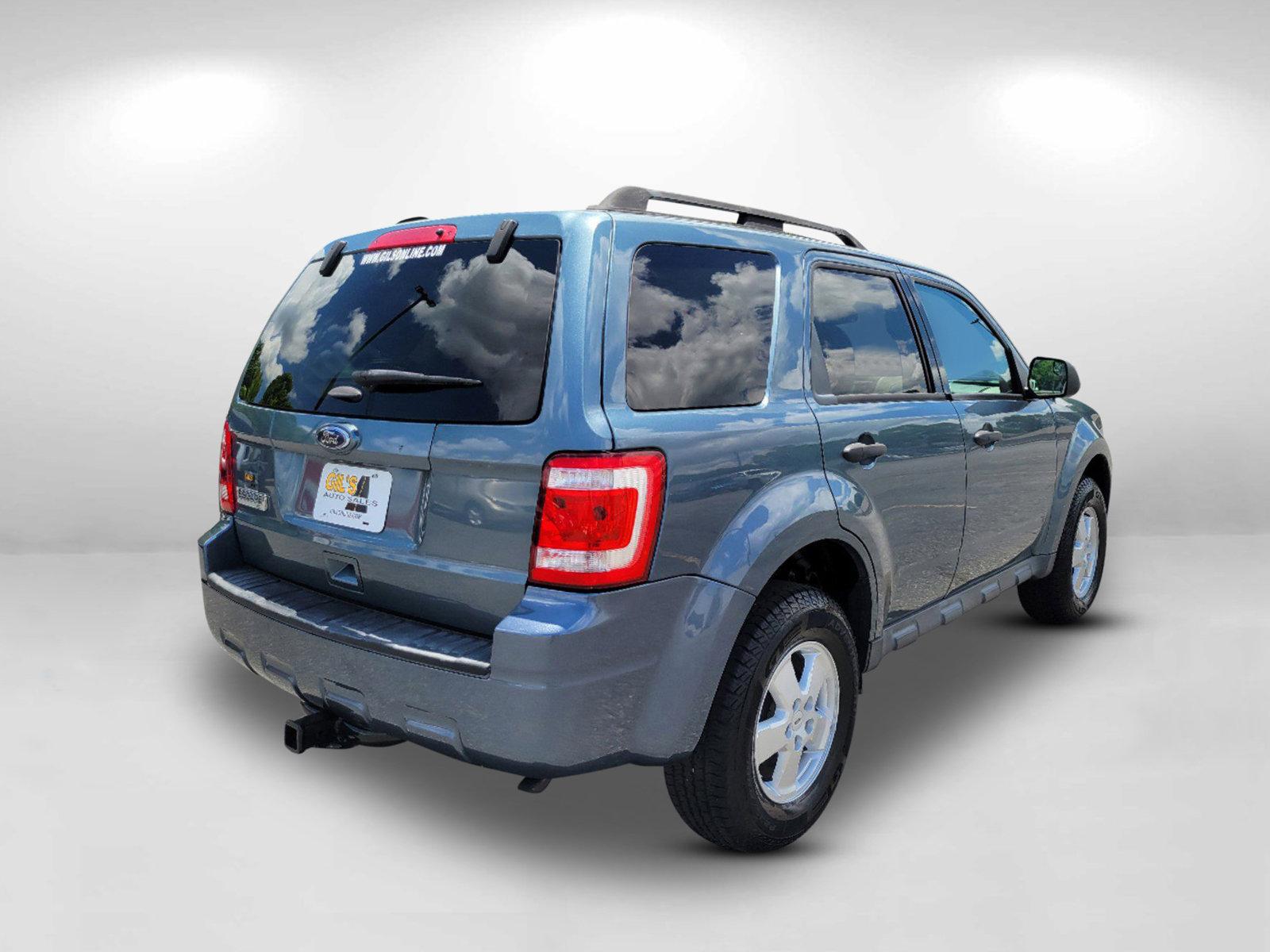 2011 Blue Ford Escape XLT (1FMCU0D73BK) with an Gas I4 2.5L/152 engine, 6-Speed Automatic transmission, located at 5115 14th Ave., Columbus, GA, 31904, (706) 323-0345, 32.511494, -84.971046 - 2011 Ford Escape XLT - Photo#8