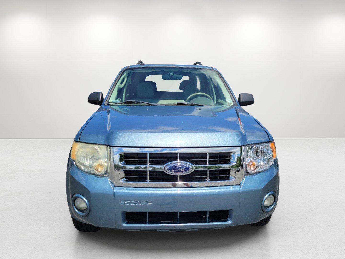 2011 Blue Ford Escape XLT (1FMCU0D73BK) with an Gas I4 2.5L/152 engine, 6-Speed Automatic transmission, located at 1430 Gateway Drive, Opelika, AL, 36801, (334) 239-0944, 32.637871, -85.409790 - 2011 Ford Escape XLT - Photo#1