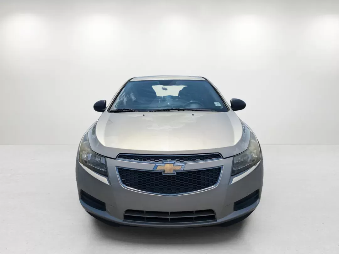 2013 Champagne Silver Metallic /Jet Black/Medium Titanium Chevrolet Cruze LS (1G1PA5SH9D7) with an Gas I4 1.8L/110 engine, 6-Speed Automatic transmission, located at 3959 U.S. 80 W, Phenix City, AL, 36870, (334) 297-4885, 32.469296, -85.135185 - 2013 Chevrolet Cruze LS - Photo#1