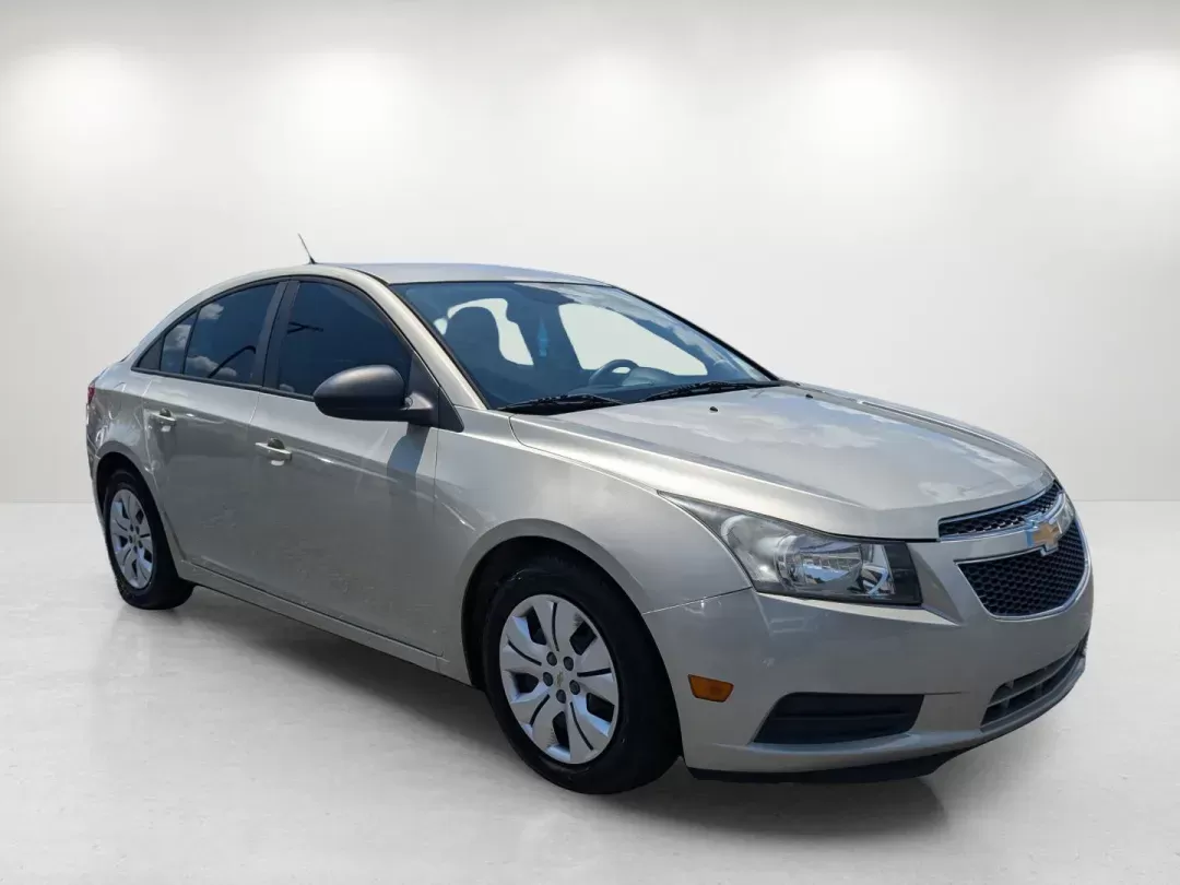 2013 Champagne Silver Metallic /Jet Black/Medium Titanium Chevrolet Cruze LS (1G1PA5SH9D7) with an Gas I4 1.8L/110 engine, 6-Speed Automatic transmission, located at 3959 U.S. 80 W, Phenix City, AL, 36870, (334) 297-4885, 32.469296, -85.135185 - 2013 Chevrolet Cruze LS - Photo#2