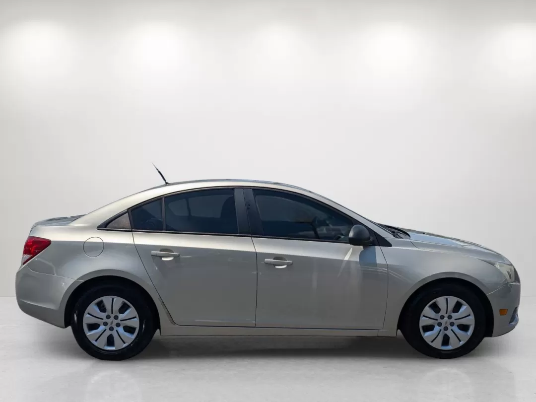 2013 Champagne Silver Metallic /Jet Black/Medium Titanium Chevrolet Cruze LS (1G1PA5SH9D7) with an Other engine, located at 3959 U.S. 80 W, Phenix City, AL, 36870, (334) 297-4885, 32.469296, -85.135185 - 2013 Chevrolet Cruze LS - Photo#4