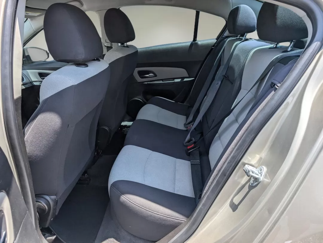 2013 Champagne Silver Metallic /Jet Black/Medium Titanium Chevrolet Cruze LS (1G1PA5SH9D7) with an Other engine, located at 3959 U.S. 80 W, Phenix City, AL, 36870, (334) 297-4885, 32.469296, -85.135185 - 2013 Chevrolet Cruze LS - Photo#11