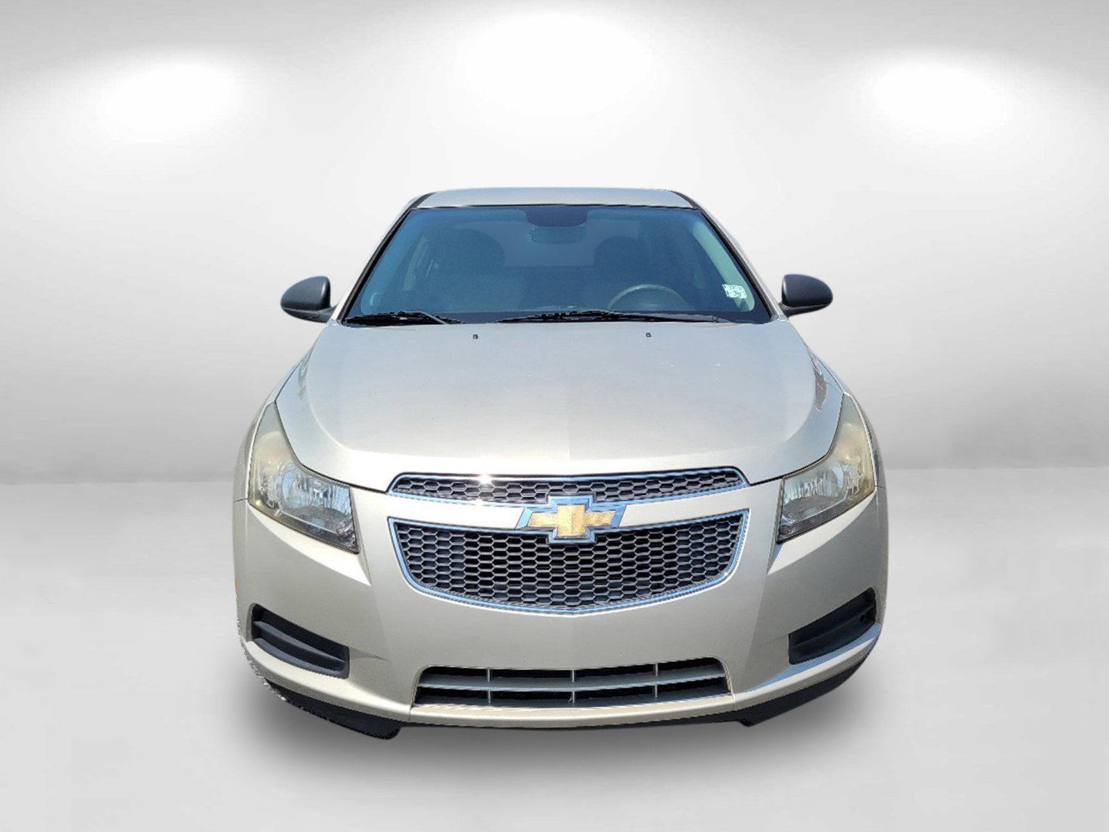 2013 Champagne Silver Metallic /Jet Black/Medium Titanium Chevrolet Cruze LS (1G1PA5SH9D7) with an Gas I4 1.8L/110 engine, 6-Speed Automatic transmission, located at 1430 Gateway Drive, Opelika, AL, 36801, (334) 239-0944, 32.637871, -85.409790 - 2013 Chevrolet Cruze LS - Photo#1