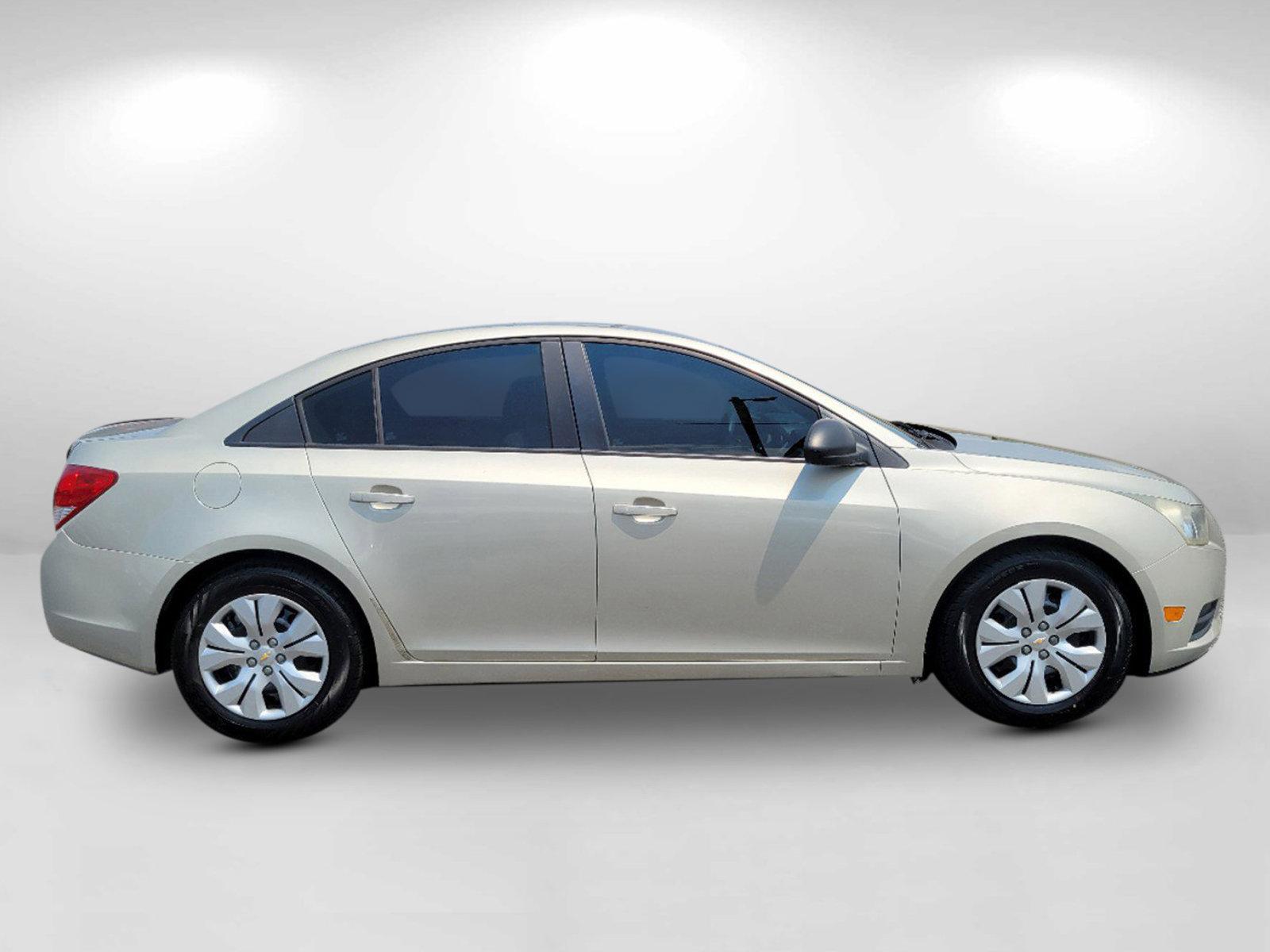 2013 Champagne Silver Metallic /Jet Black/Medium Titanium Chevrolet Cruze LS (1G1PA5SH9D7) with an Gas I4 1.8L/110 engine, 6-Speed Automatic transmission, located at 1430 Gateway Drive, Opelika, AL, 36801, (334) 239-0944, 32.637871, -85.409790 - 2013 Chevrolet Cruze LS - Photo#2