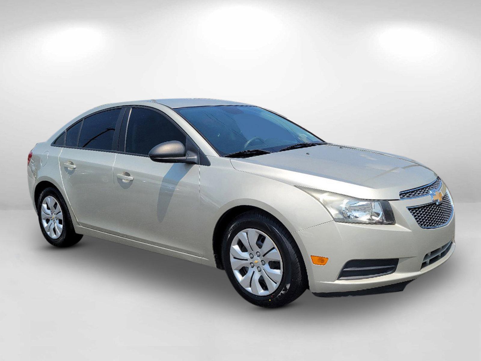 2013 Champagne Silver Metallic /Jet Black/Medium Titanium Chevrolet Cruze LS (1G1PA5SH9D7) with an Gas I4 1.8L/110 engine, 6-Speed Automatic transmission, located at 1430 Gateway Drive, Opelika, AL, 36801, (334) 239-0944, 32.637871, -85.409790 - 2013 Chevrolet Cruze LS - Photo#3