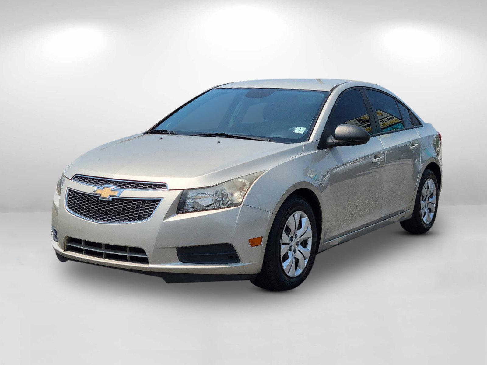 2013 Champagne Silver Metallic /Jet Black/Medium Titanium Chevrolet Cruze LS (1G1PA5SH9D7) with an Gas I4 1.8L/110 engine, 6-Speed Automatic transmission, located at 3959 U.S. 80 W, Phenix City, AL, 36870, (334) 297-4885, 32.469296, -85.135185 - 2013 Chevrolet Cruze LS - Photo#1