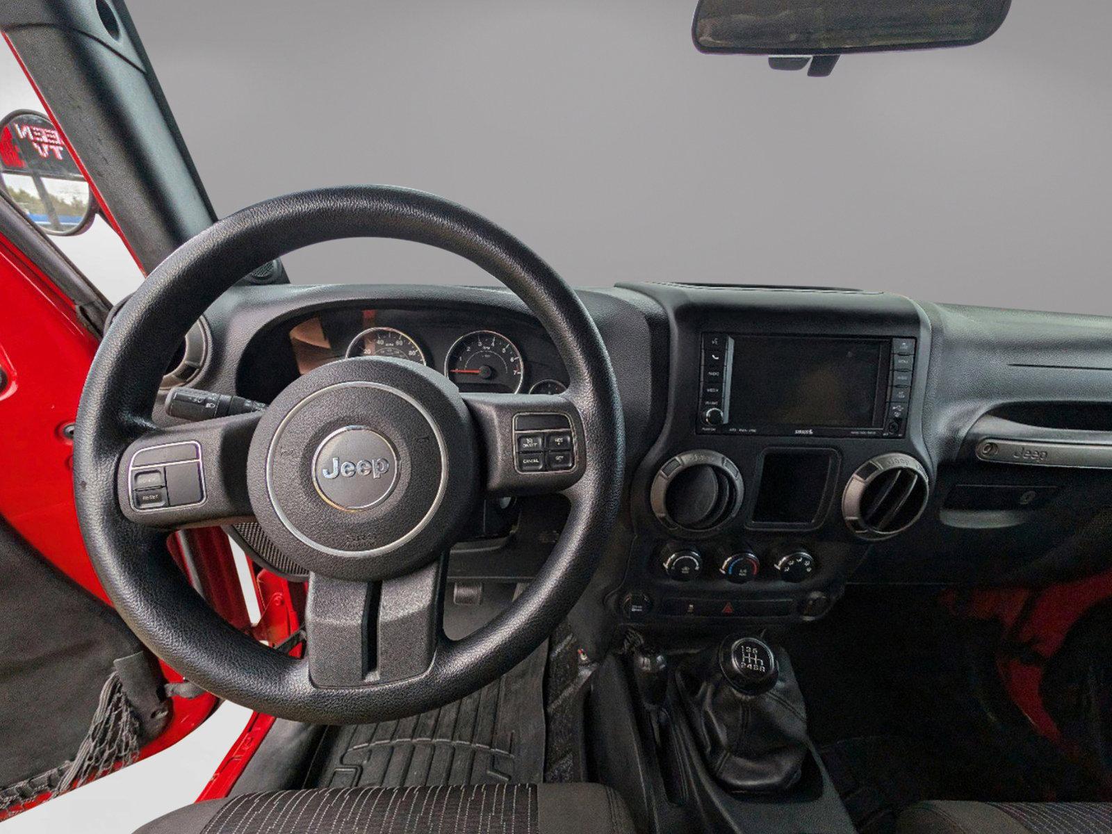 2012 /Black Interior Jeep Wrangler Sport (1C4AJWAG6CL) with an Gas V6 3.6L/231 engine, 6-Speed Manual transmission, located at 804 22nd Ave, Phenix City, AL, 36870, (334) 297-1860, 32.484749, -85.024475 - 2012 Jeep Wrangler Sport - Photo#12