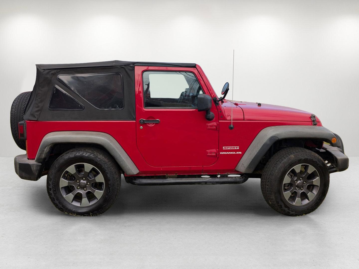 2012 /Black Interior Jeep Wrangler Sport (1C4AJWAG6CL) with an Gas V6 3.6L/231 engine, 6-Speed Manual transmission, located at 804 22nd Ave, Phenix City, AL, 36870, (334) 297-1860, 32.484749, -85.024475 - 2012 Jeep Wrangler Sport - Photo#3