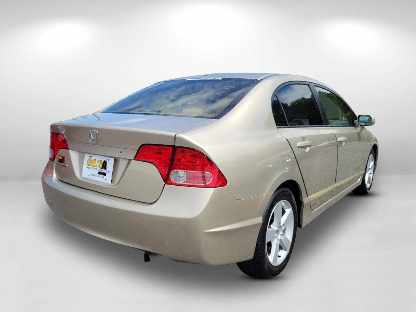 2007 Gold Honda Civic Sdn EX (1HGFA16877L) with an Gas I4 1.8L/110 engine, 5-Speed Automatic transmission, located at 1430 Gateway Drive, Opelika, AL, 36801, (334) 239-0944, 32.637871, -85.409790 - 2007 Honda Civic Sdn EX - Photo#4