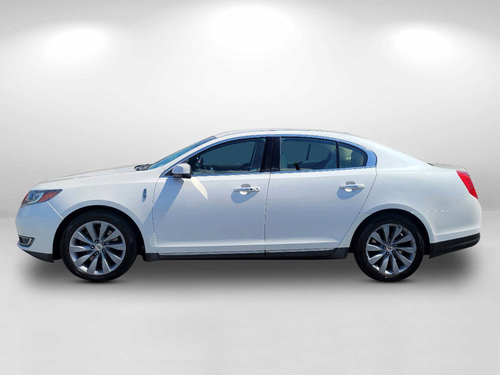 2013 White Lincoln MKS (1LNHL9DKXDG) with an Gas V6 3.7L/ engine, 6-Speed Automatic transmission, located at 7000 Northlake Connector, Columbus, GA, 31904, (706) 987-8085, 32.524975, -84.978134 - 2013 Lincoln MKS - Photo#7