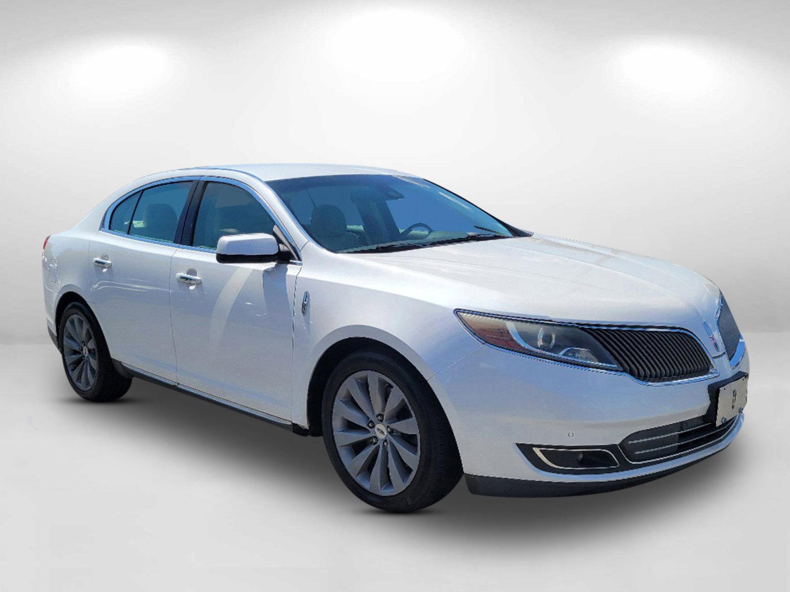 2013 White Lincoln MKS (1LNHL9DKXDG) with an Gas V6 3.7L/ engine, 6-Speed Automatic transmission, located at 7000 Northlake Connector, Columbus, GA, 31904, (706) 987-8085, 32.524975, -84.978134 - 2013 Lincoln MKS - Photo#2