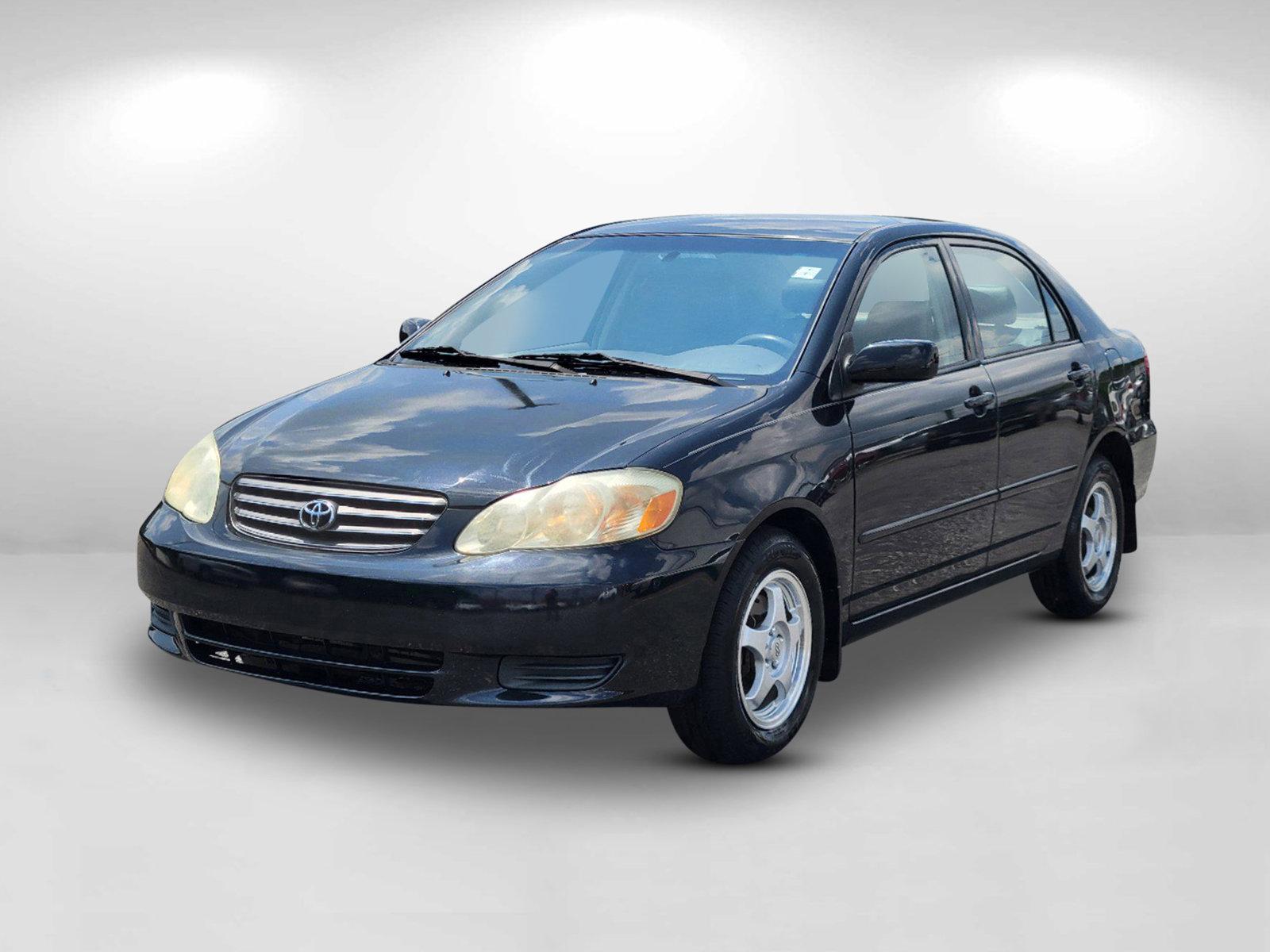 2003 Black /Gray Toyota Corolla LE (JTDBR32E730) with an Gas I4 1.8L/108 engine, 4-Speed Automatic w/OD transmission, located at 521 Old Farm Lane Rd, Prattville, AL, 36066, (334) 325-1505, 32.482460, -86.416367 - 2003 Toyota Corolla LE - Photo#0