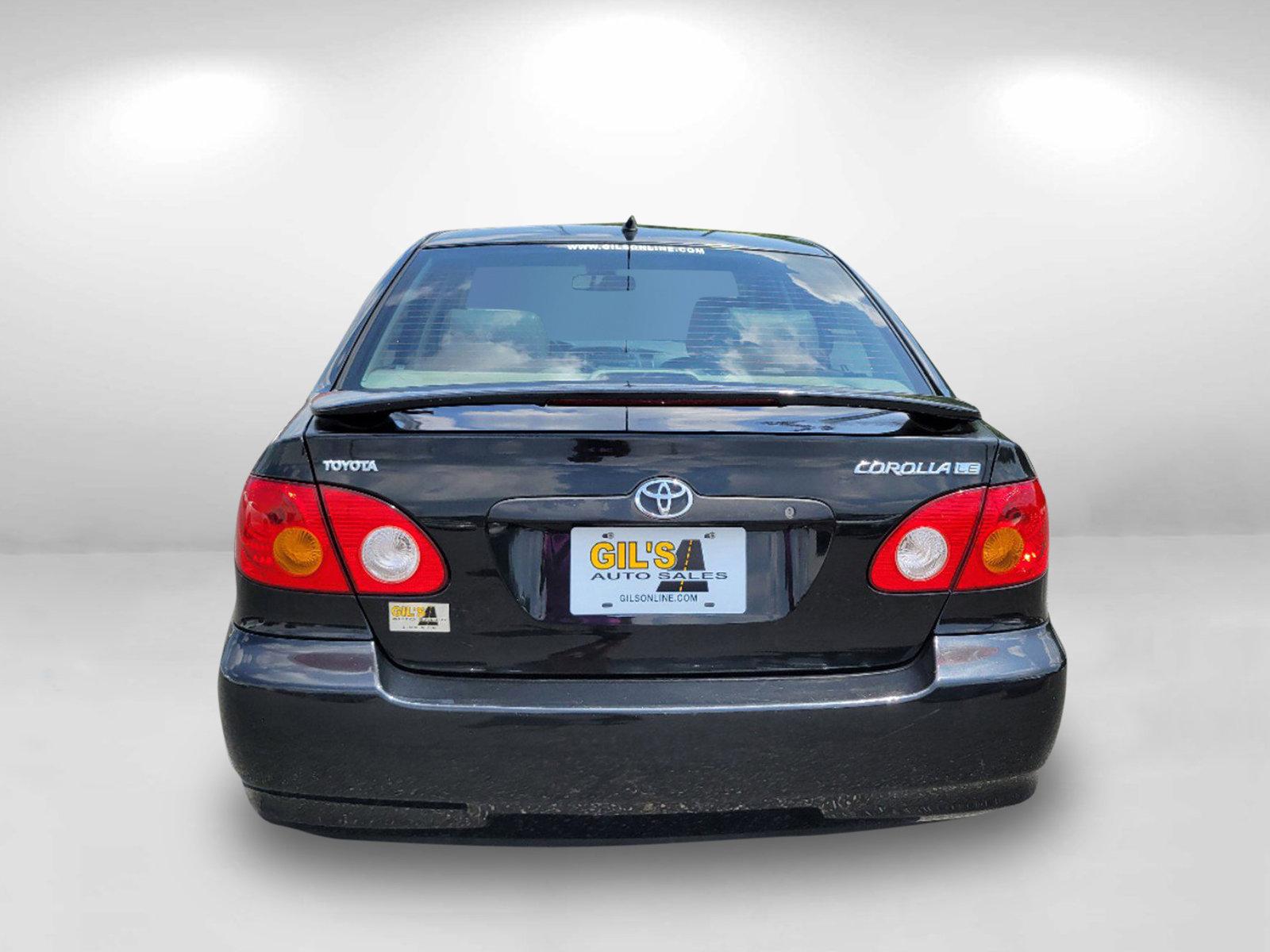 2003 Black /Gray Toyota Corolla LE (JTDBR32E730) with an Gas I4 1.8L/108 engine, 4-Speed Automatic w/OD transmission, located at 521 Old Farm Lane Rd, Prattville, AL, 36066, (334) 325-1505, 32.482460, -86.416367 - 2003 Toyota Corolla LE - Photo#5