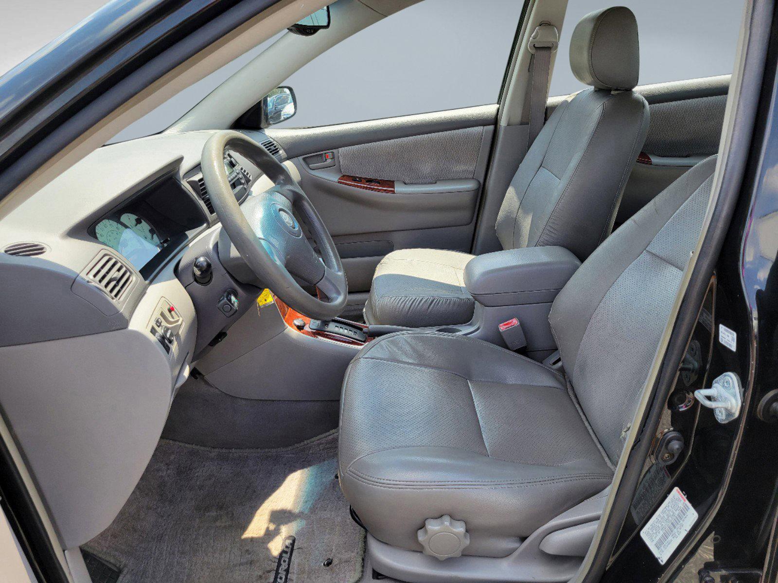 2003 Black /Gray Toyota Corolla LE (JTDBR32E730) with an Gas I4 1.8L/108 engine, 4-Speed Automatic w/OD transmission, located at 521 Old Farm Lane Rd, Prattville, AL, 36066, (334) 325-1505, 32.482460, -86.416367 - 2003 Toyota Corolla LE - Photo#9