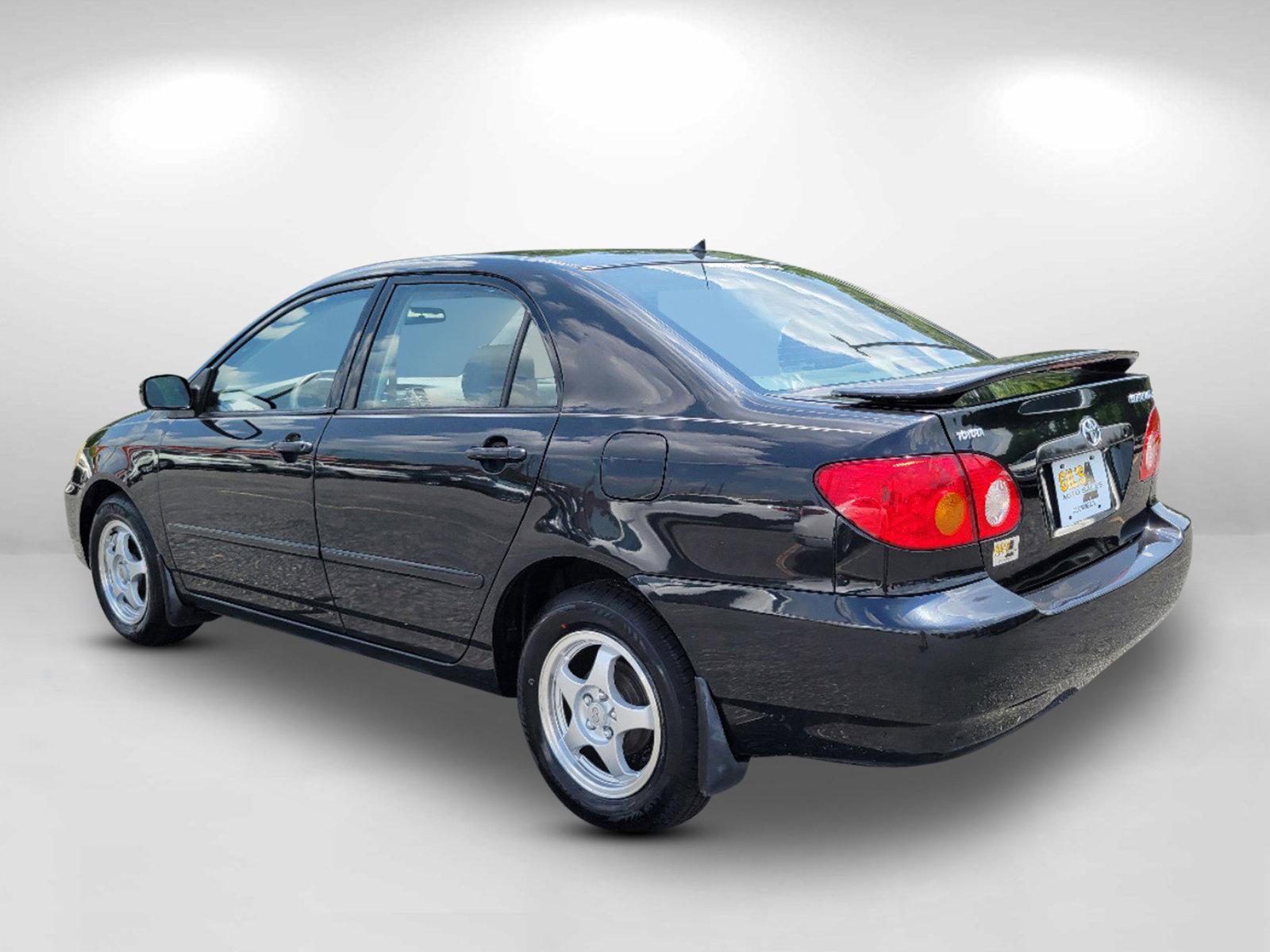 2003 Black /Gray Toyota Corolla LE (JTDBR32E730) with an Gas I4 1.8L/108 engine, 4-Speed Automatic w/OD transmission, located at 1430 Gateway Drive, Opelika, AL, 36801, (334) 239-0944, 32.637871, -85.409790 - 2003 Toyota Corolla LE - Photo#6