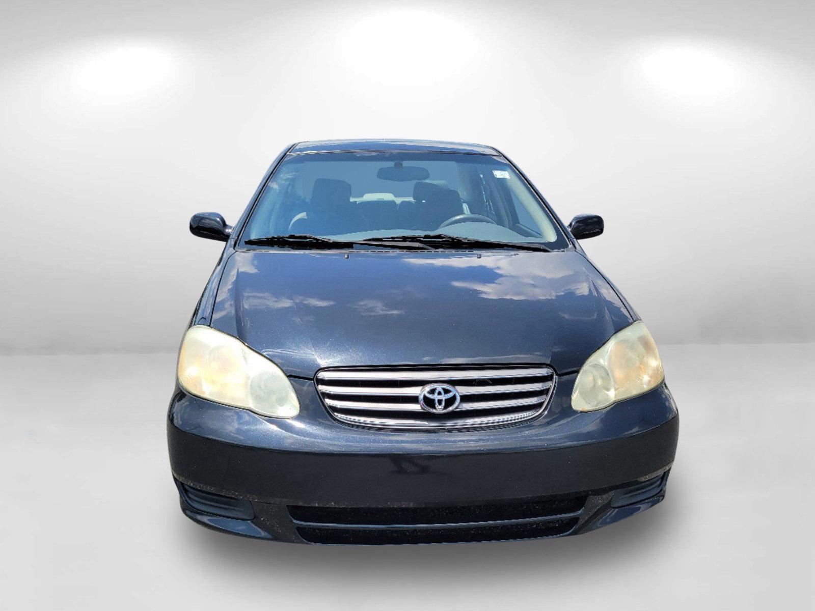 2003 Black /Gray Toyota Corolla LE (JTDBR32E730) with an Gas I4 1.8L/108 engine, 4-Speed Automatic w/OD transmission, located at 3959 U.S. 80 W, Phenix City, AL, 36870, (334) 297-4885, 32.469296, -85.135185 - 2003 Toyota Corolla LE - Photo#1