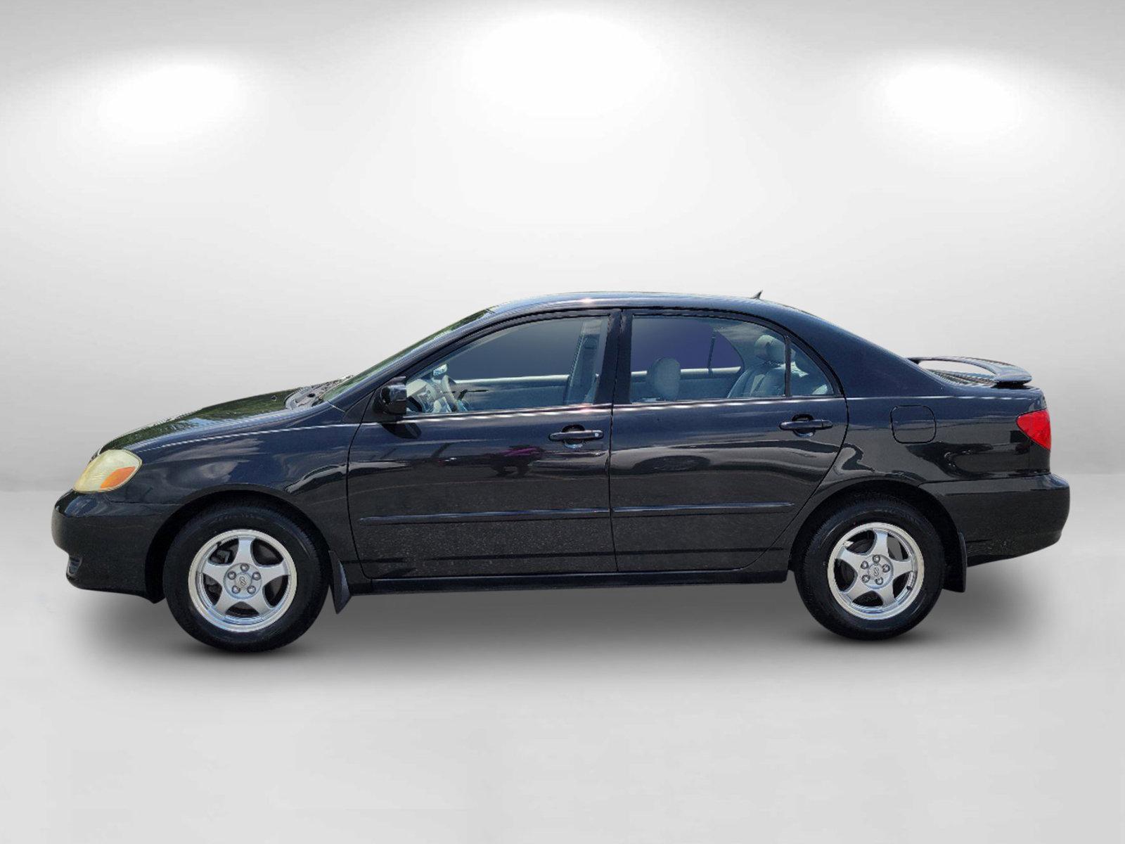 2003 Black /Gray Toyota Corolla LE (JTDBR32E730) with an Gas I4 1.8L/108 engine, 4-Speed Automatic w/OD transmission, located at 3959 U.S. 80 W, Phenix City, AL, 36870, (334) 297-4885, 32.469296, -85.135185 - 2003 Toyota Corolla LE - Photo#7