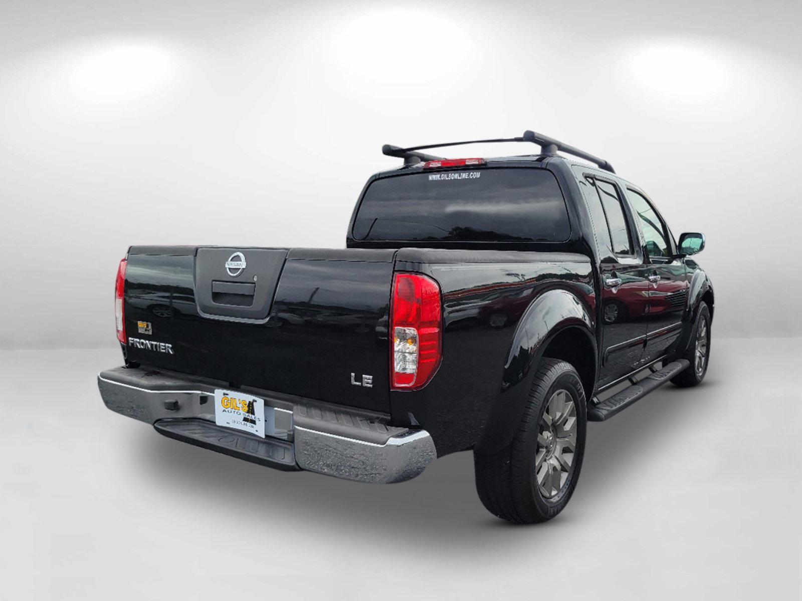 2010 Super Black /Graphite Nissan Frontier LE (1N6AD0ER7AC) with an Gas V6 4.0L/ engine, 5-Speed Automatic w/OD transmission, located at 3959 U.S. 80 W, Phenix City, AL, 36870, (334) 297-4885, 32.469296, -85.135185 - 2010 Nissan Frontier LE - Photo#4