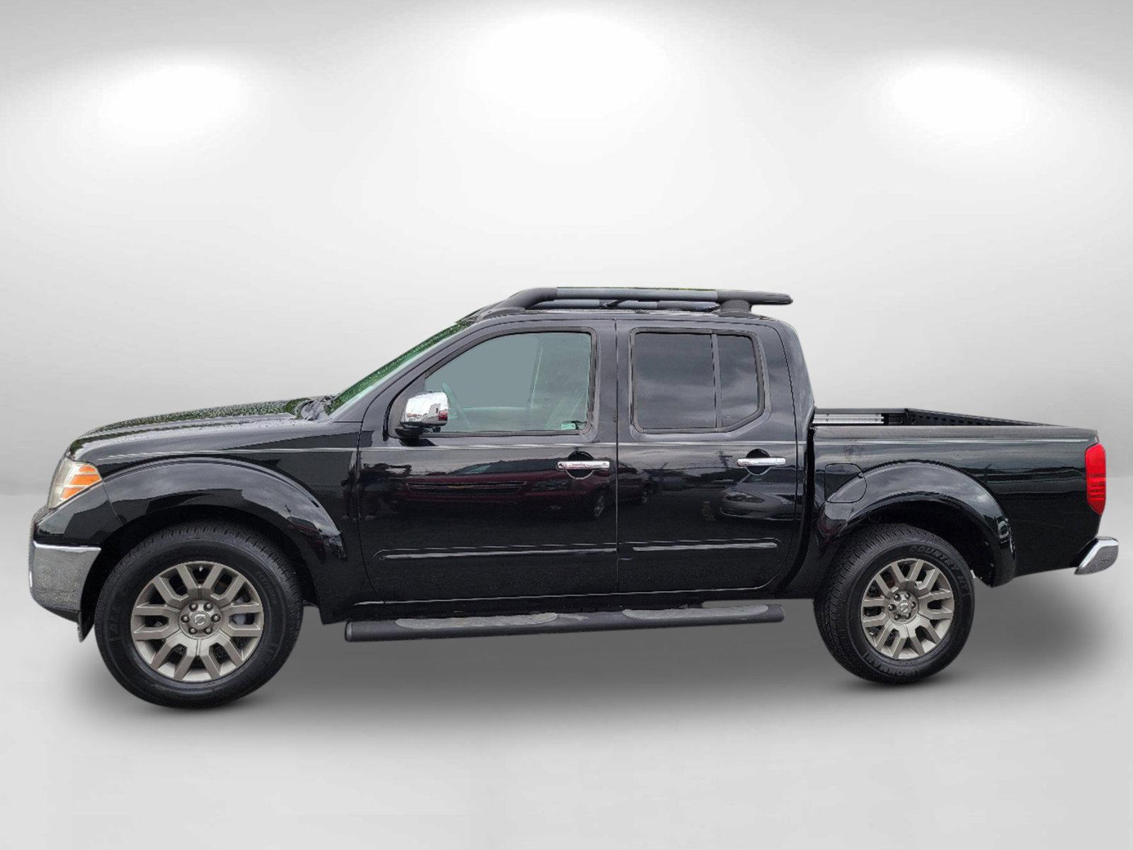 2010 Super Black /Graphite Nissan Frontier LE (1N6AD0ER7AC) with an Gas V6 4.0L/ engine, 5-Speed Automatic w/OD transmission, located at 3959 U.S. 80 W, Phenix City, AL, 36870, (334) 297-4885, 32.469296, -85.135185 - 2010 Nissan Frontier LE - Photo#7