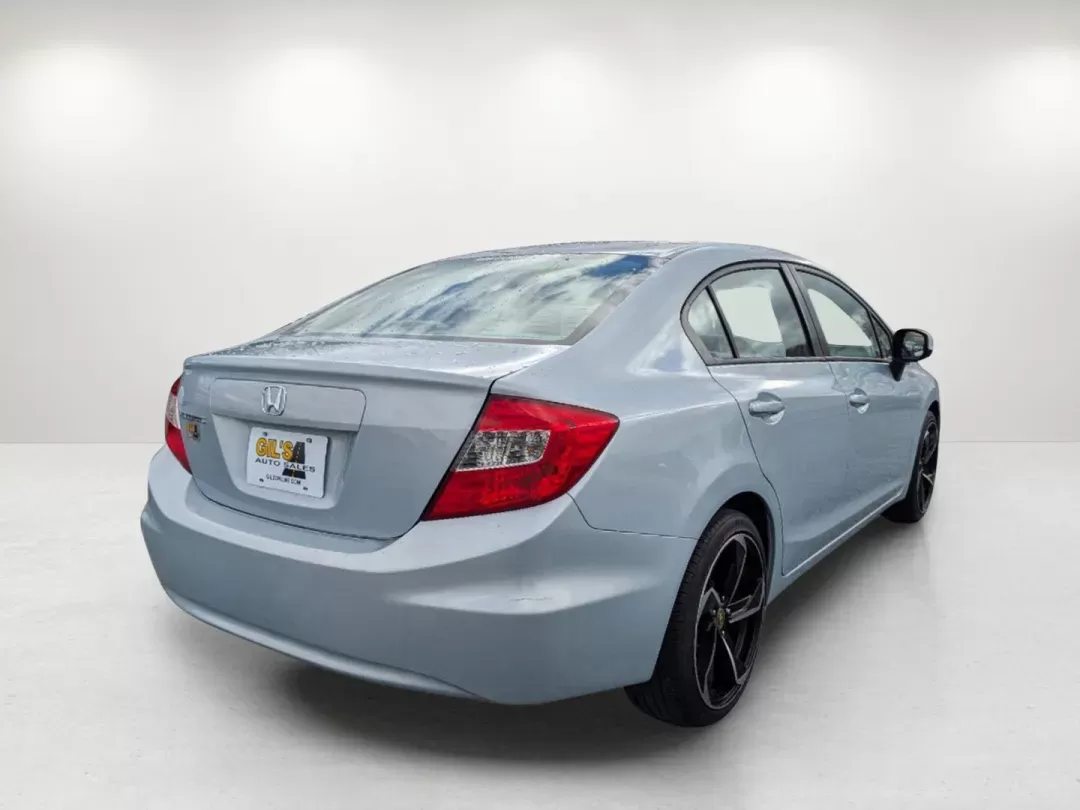 2012 Honda Civic Sdn LX (19XFB2F53CE) with an Gas I4 1.8L/110 engine, 5-Speed Automatic transmission, located at 3959 U.S. 80 W, Phenix City, AL, 36870, (334) 297-4885, 32.469296, -85.135185 - 2012 Honda Civic Sdn LX - Photo#4