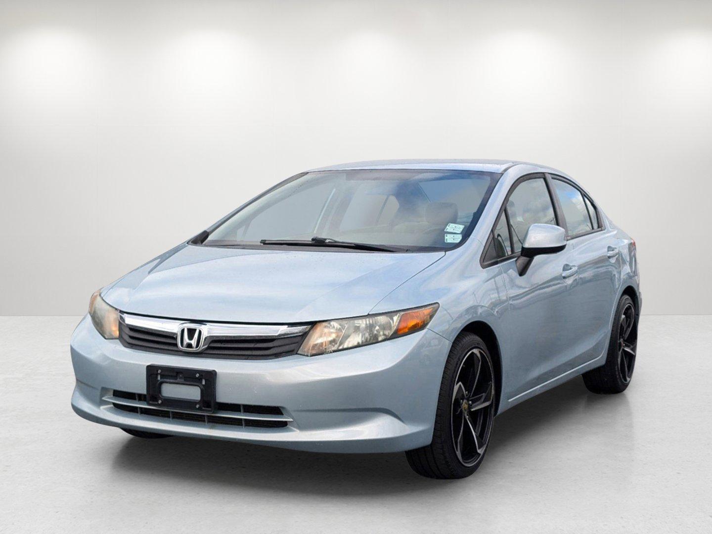 2012 Honda Civic Sdn LX (19XFB2F53CE) with an Gas I4 1.8L/110 engine, 5-Speed Automatic transmission, located at 1430 Gateway Drive, Opelika, AL, 36801, (334) 239-0944, 32.637871, -85.409790 - 2012 Honda Civic Sdn LX - Photo#0