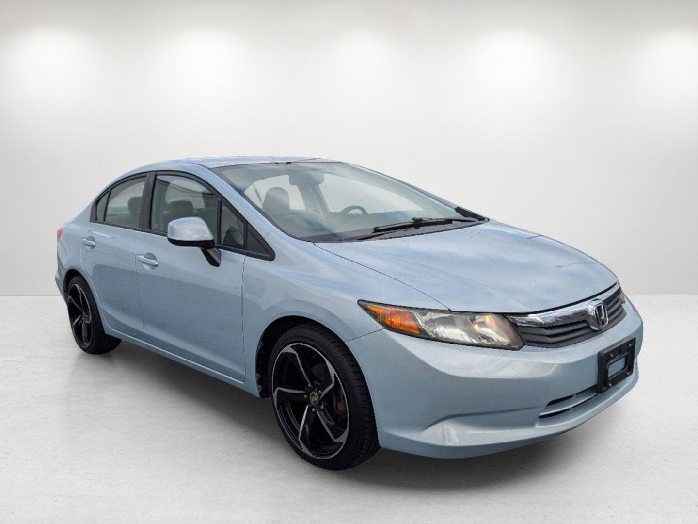 2012 Honda Civic Sdn LX (19XFB2F53CE) with an Gas I4 1.8L/110 engine, 5-Speed Automatic transmission, located at 1430 Gateway Drive, Opelika, AL, 36801, (334) 239-0944, 32.637871, -85.409790 - 2012 Honda Civic Sdn LX - Photo#2