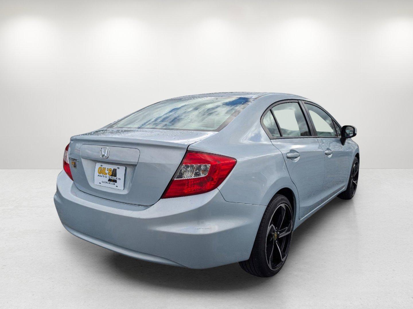 2012 Honda Civic Sdn LX (19XFB2F53CE) with an Gas I4 1.8L/110 engine, 5-Speed Automatic transmission, located at 1430 Gateway Drive, Opelika, AL, 36801, (334) 239-0944, 32.637871, -85.409790 - 2012 Honda Civic Sdn LX - Photo#4