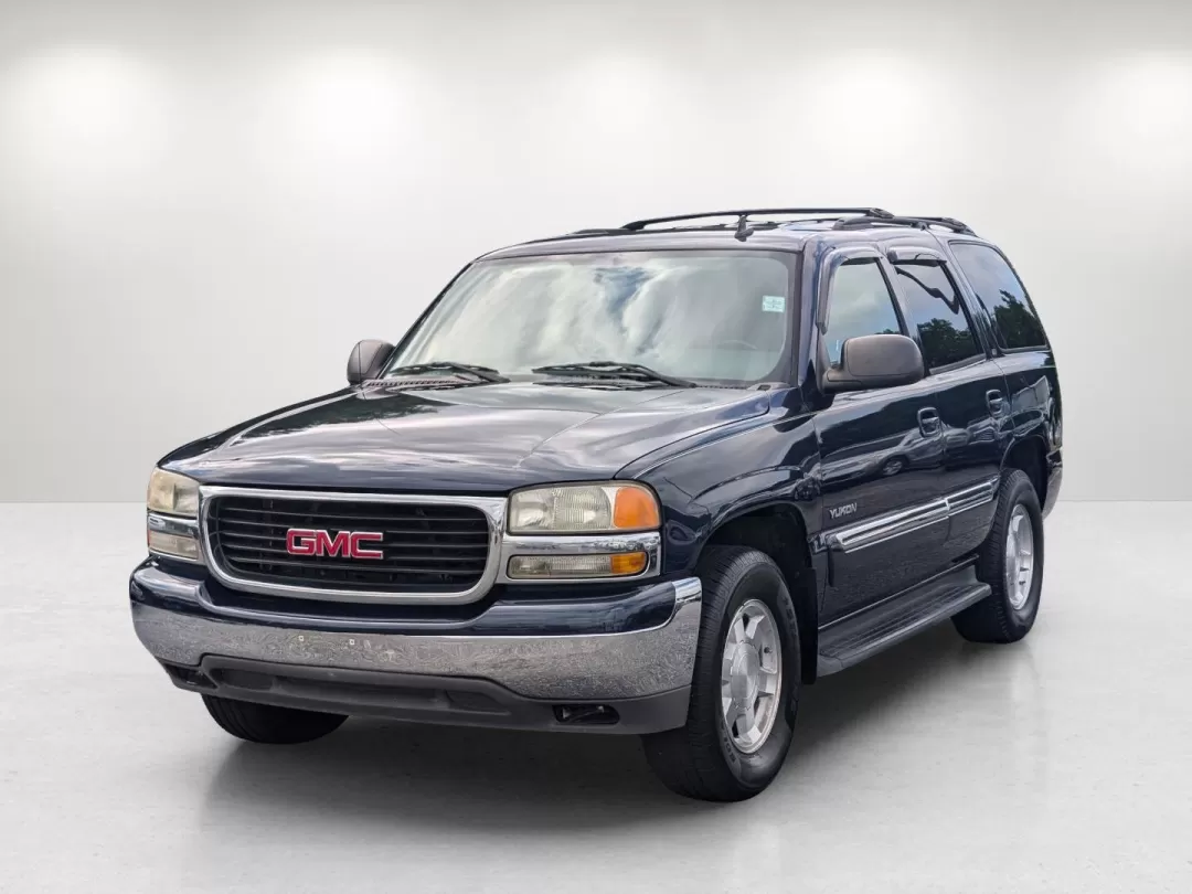 2006 Deep Blue Metallic /Pewter/Dark Pewter GMC Yukon SLT (1GKEC13T76R) with an Other engine, located at 3959 U.S. 80 W, Phenix City, AL, 36870, (334) 297-4885, 32.469296, -85.135185 - **Embark on Your Next Adventure with the 2006 GMC Yukon SLT at Gils Auto!**<br /> <br /> If you're looking for a vehicle that's not just a mode of transportation but a true companion for life's adventures, the 2006 GMC Yukon SLT is your ideal match. With its spacious interior and robust build, this - Photo#1