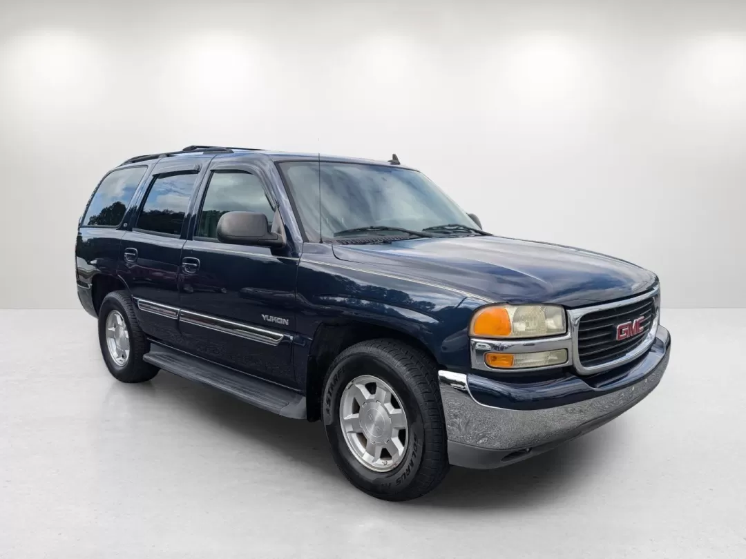 2006 Deep Blue Metallic /Pewter/Dark Pewter GMC Yukon SLT (1GKEC13T76R) with an Other engine, located at 3959 U.S. 80 W, Phenix City, AL, 36870, (334) 297-4885, 32.469296, -85.135185 - **Embark on Your Next Adventure with the 2006 GMC Yukon SLT at Gils Auto!**<br /> <br /> If you're looking for a vehicle that's not just a mode of transportation but a true companion for life's adventures, the 2006 GMC Yukon SLT is your ideal match. With its spacious interior and robust build, this - Photo#3