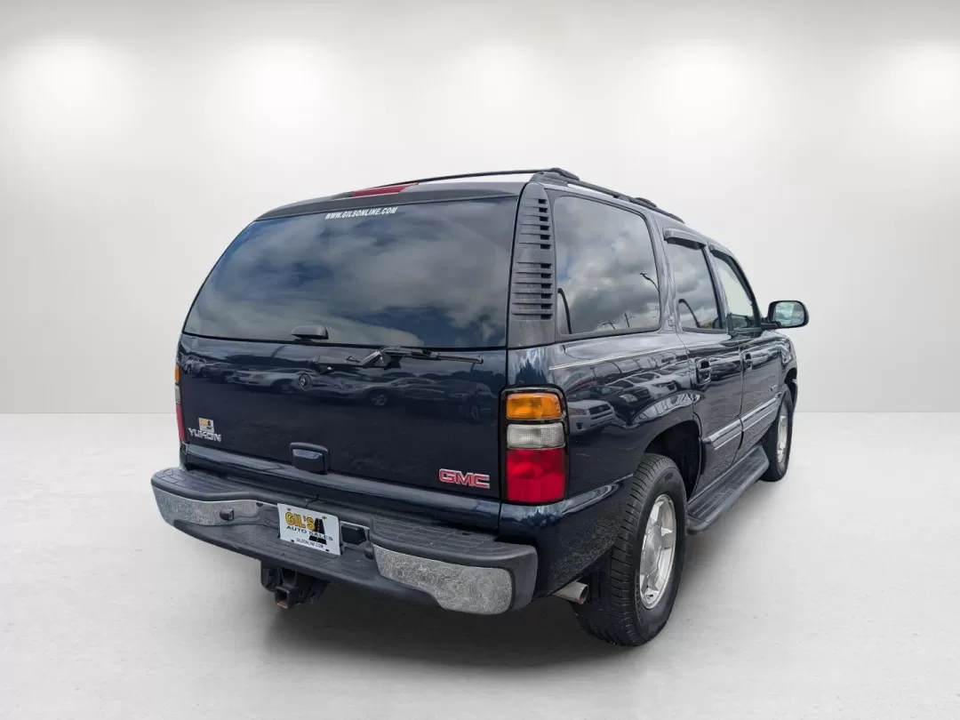 2006 Deep Blue Metallic /Pewter/Dark Pewter GMC Yukon SLT (1GKEC13T76R) with an Other engine, located at 3959 U.S. 80 W, Phenix City, AL, 36870, (334) 297-4885, 32.469296, -85.135185 - **Embark on Your Next Adventure with the 2006 GMC Yukon SLT at Gils Auto!**<br /> <br /> If you're looking for a vehicle that's not just a mode of transportation but a true companion for life's adventures, the 2006 GMC Yukon SLT is your ideal match. With its spacious interior and robust build, this - Photo#5