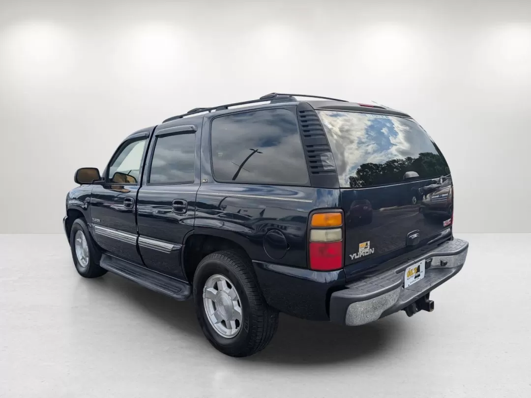 2006 Deep Blue Metallic /Pewter/Dark Pewter GMC Yukon SLT (1GKEC13T76R) with an Other engine, located at 3959 U.S. 80 W, Phenix City, AL, 36870, (334) 297-4885, 32.469296, -85.135185 - **Embark on Your Next Adventure with the 2006 GMC Yukon SLT at Gils Auto!**<br /> <br /> If you're looking for a vehicle that's not just a mode of transportation but a true companion for life's adventures, the 2006 GMC Yukon SLT is your ideal match. With its spacious interior and robust build, this - Photo#7