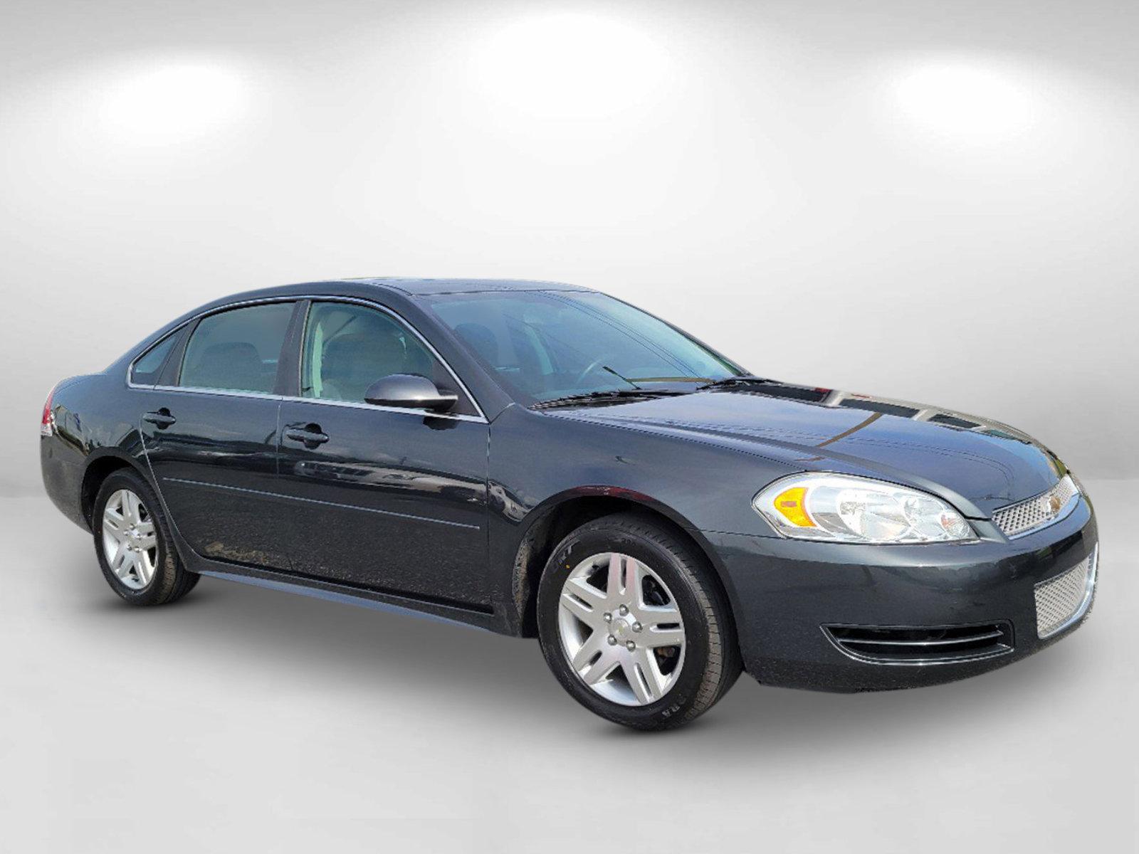 2015 Ashen Gray Metallic /Ebony Chevrolet Impala Limited LT (2G1WB5E32F1) with an Gas/Ethanol V6 3.6L/217 engine, 6-Speed Automatic transmission, located at 1430 Gateway Drive, Opelika, AL, 36801, (334) 239-0944, 32.637871, -85.409790 - 2015 Chevrolet Impala Limited LT - Photo#2