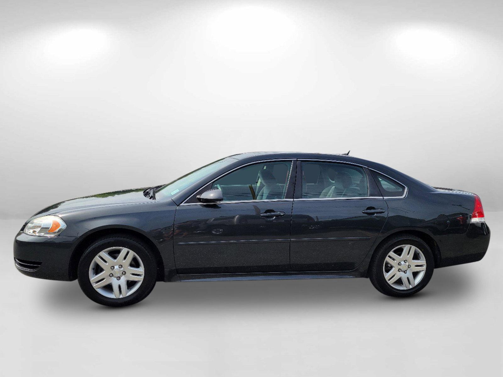 2015 Ashen Gray Metallic /Ebony Chevrolet Impala Limited LT (2G1WB5E32F1) with an Gas/Ethanol V6 3.6L/217 engine, 6-Speed Automatic transmission, located at 1430 Gateway Drive, Opelika, AL, 36801, (334) 239-0944, 32.637871, -85.409790 - 2015 Chevrolet Impala Limited LT - Photo#7