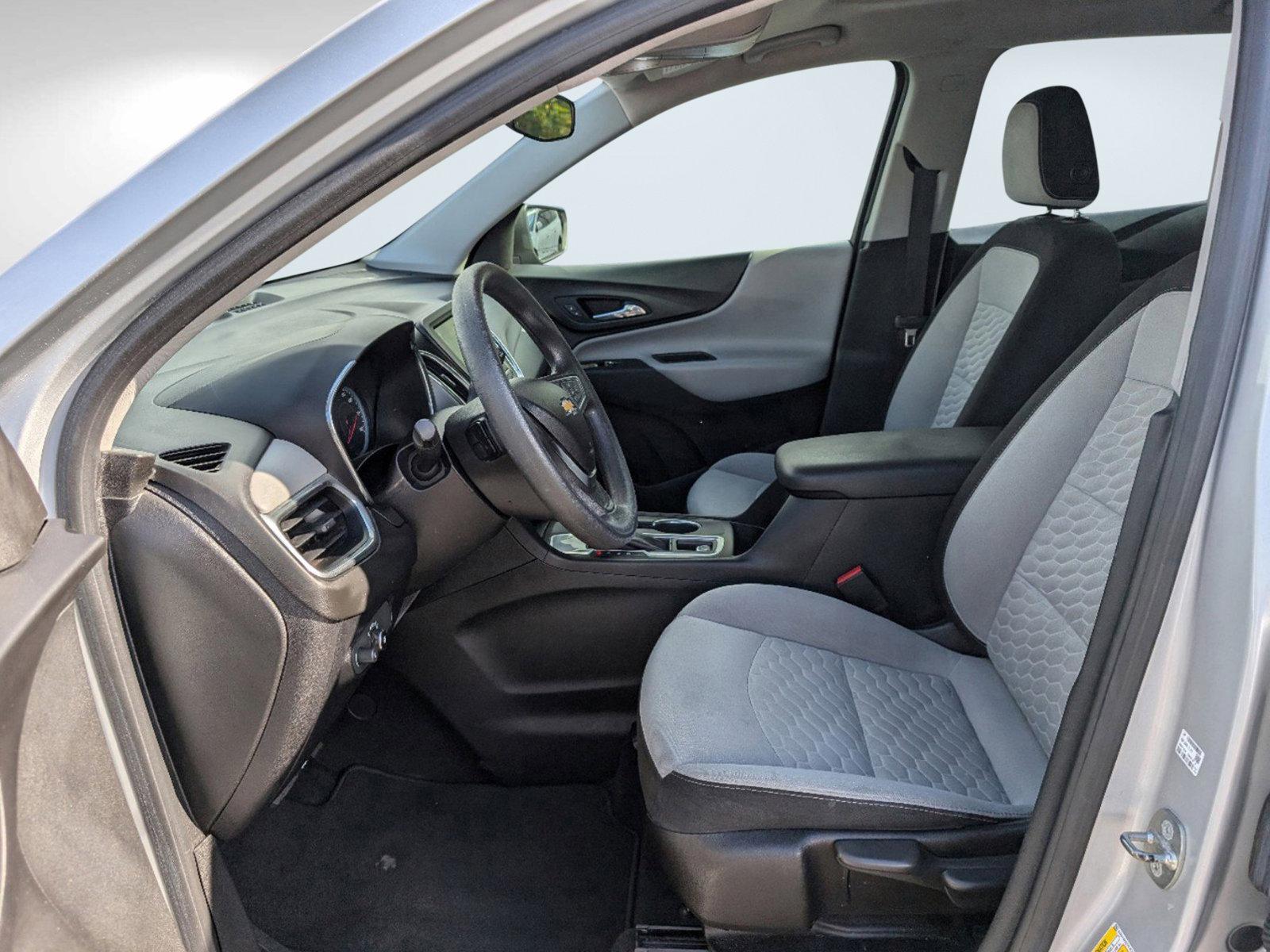 2018 /Medium Ash Gray Chevrolet Equinox LS (2GNAXHEV6J6) with an Turbocharged Gas I4 1.5L/ engine, 6-Speed Automatic transmission, located at 804 22nd Ave, Phenix City, AL, 36870, (334) 297-1860, 32.484749, -85.024475 - 2018 Chevrolet Equinox LS - Photo#11