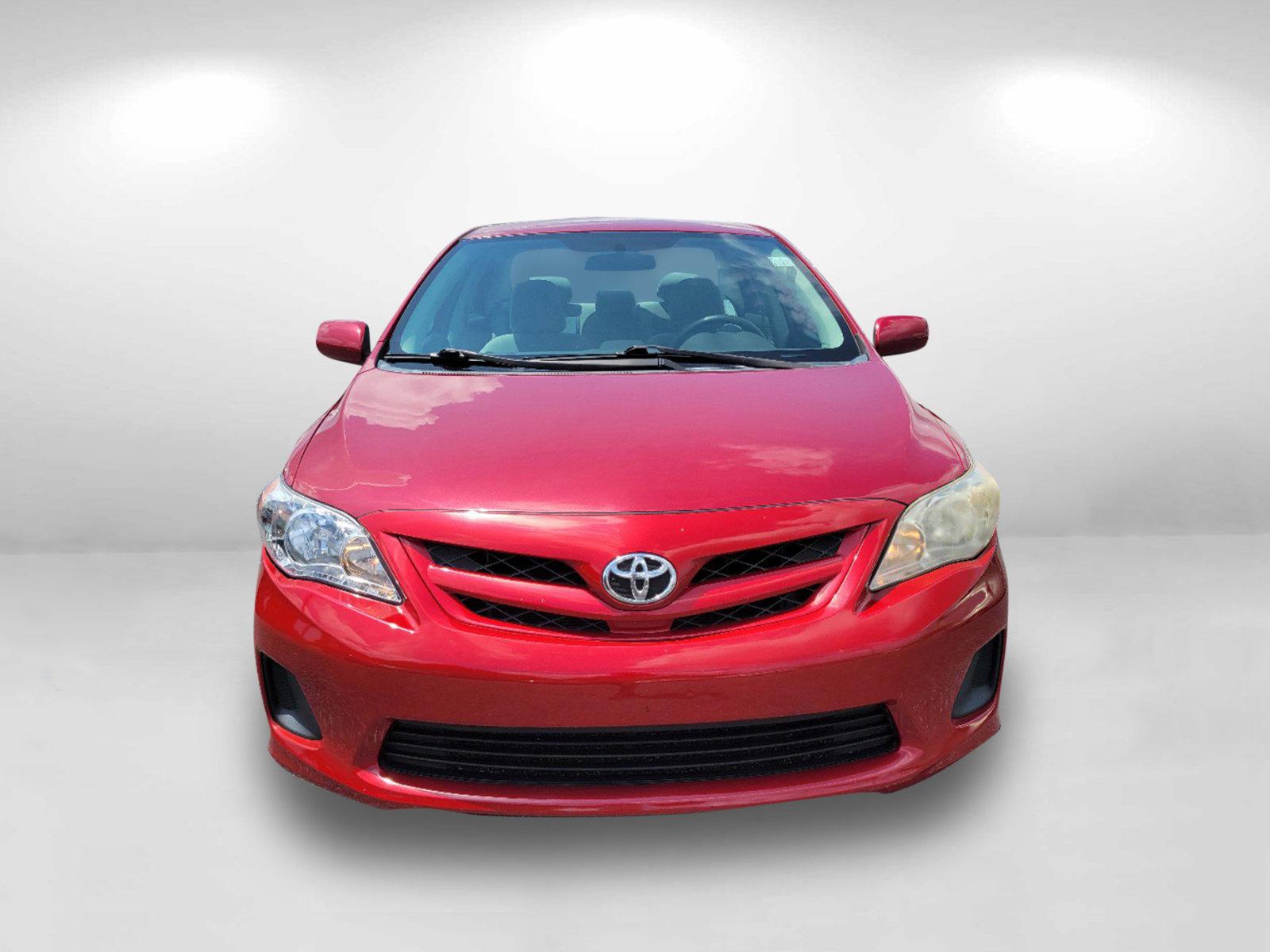 2012 Red Toyota Corolla LE (2T1BU4EE3CC) with an Gas I4 1.8L/110 engine, 4-Speed Automatic transmission, located at 1430 Gateway Drive, Opelika, AL, 36801, (334) 239-0944, 32.637871, -85.409790 - 2012 Toyota Corolla LE - Photo#1