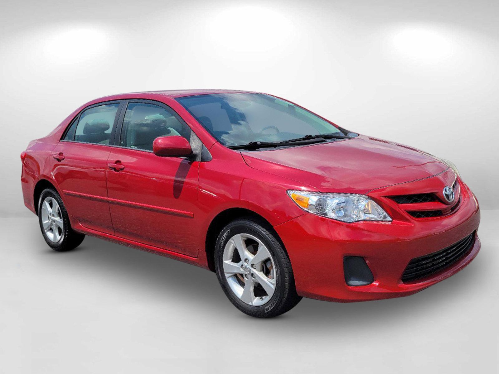 2012 Red Toyota Corolla LE (2T1BU4EE3CC) with an Gas I4 1.8L/110 engine, 4-Speed Automatic transmission, located at 1430 Gateway Drive, Opelika, AL, 36801, (334) 239-0944, 32.637871, -85.409790 - 2012 Toyota Corolla LE - Photo#2