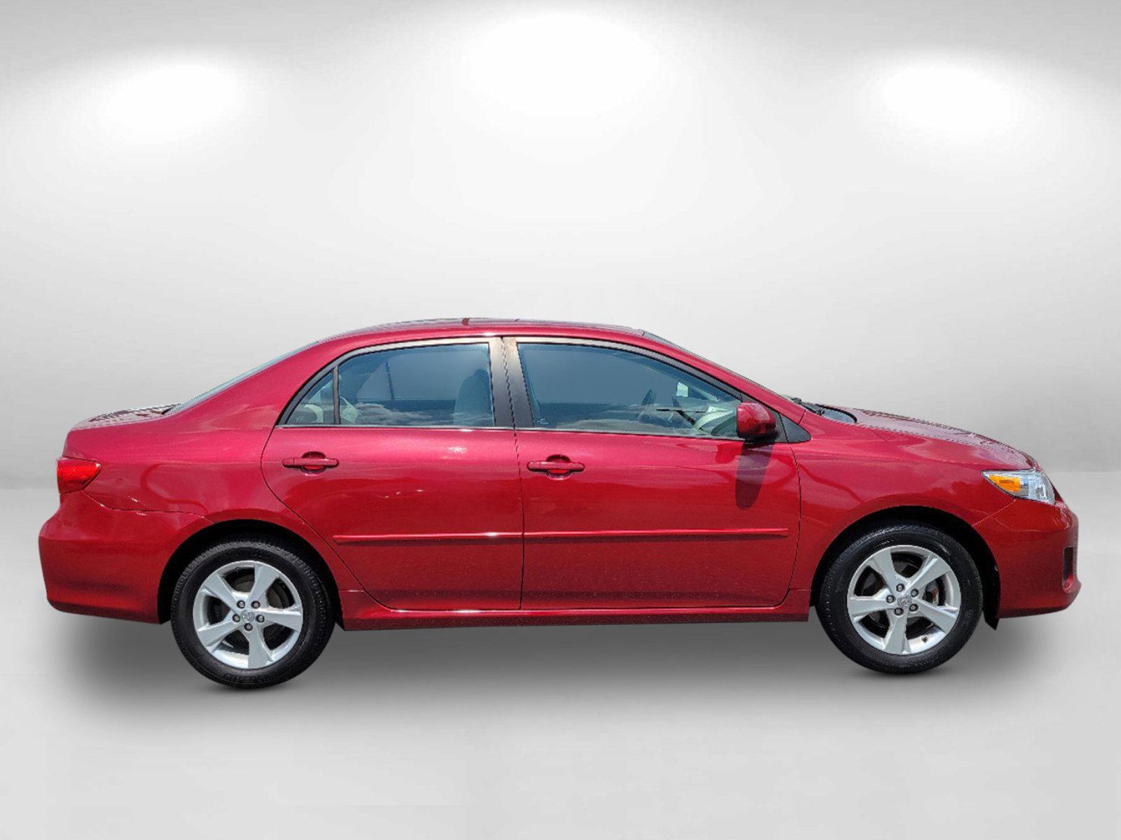 2012 Red Toyota Corolla LE (2T1BU4EE3CC) with an Gas I4 1.8L/110 engine, 4-Speed Automatic transmission, located at 1430 Gateway Drive, Opelika, AL, 36801, (334) 239-0944, 32.637871, -85.409790 - 2012 Toyota Corolla LE - Photo#3