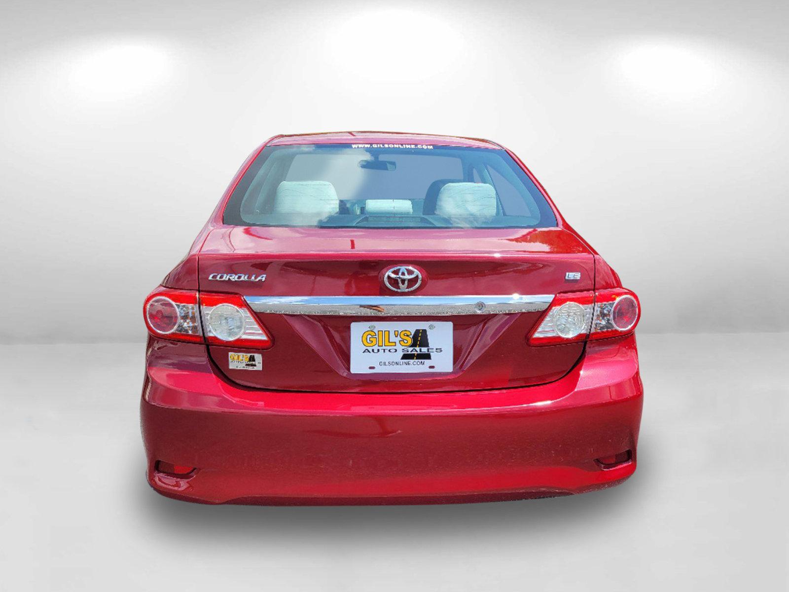 2012 Red Toyota Corolla LE (2T1BU4EE3CC) with an Gas I4 1.8L/110 engine, 4-Speed Automatic transmission, located at 1430 Gateway Drive, Opelika, AL, 36801, (334) 239-0944, 32.637871, -85.409790 - 2012 Toyota Corolla LE - Photo#5