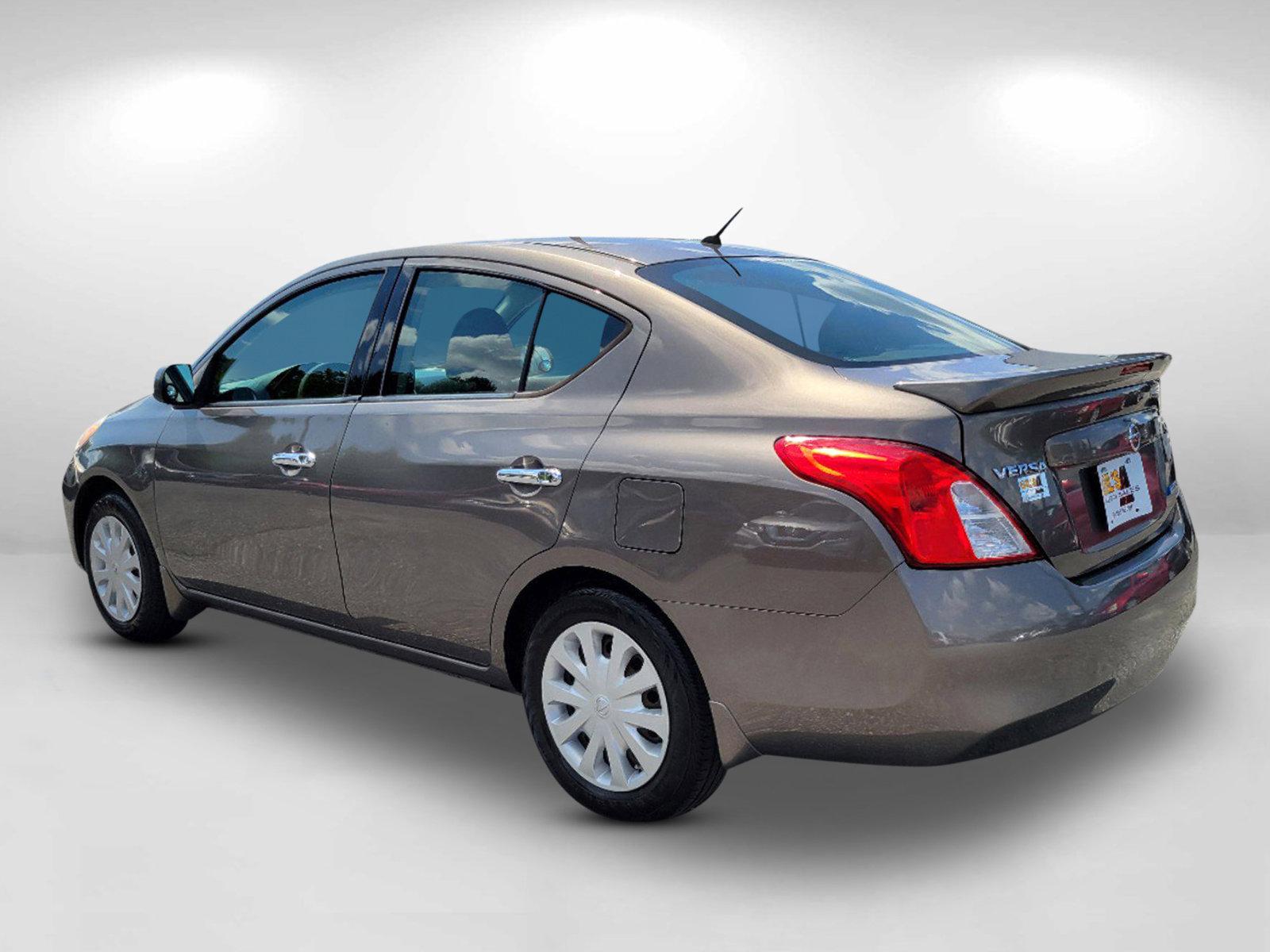 2014 Titanium /Charcoal Nissan Versa SV (3N1CN7AP4EL) with an Regular Unleaded I-4 1.6 L/98 engine, 1-Speed CVT w/OD transmission, located at 521 Old Farm Lane Rd, Prattville, AL, 36066, (334) 325-1505, 32.482460, -86.416367 - 2014 Nissan Versa SV - Photo#6