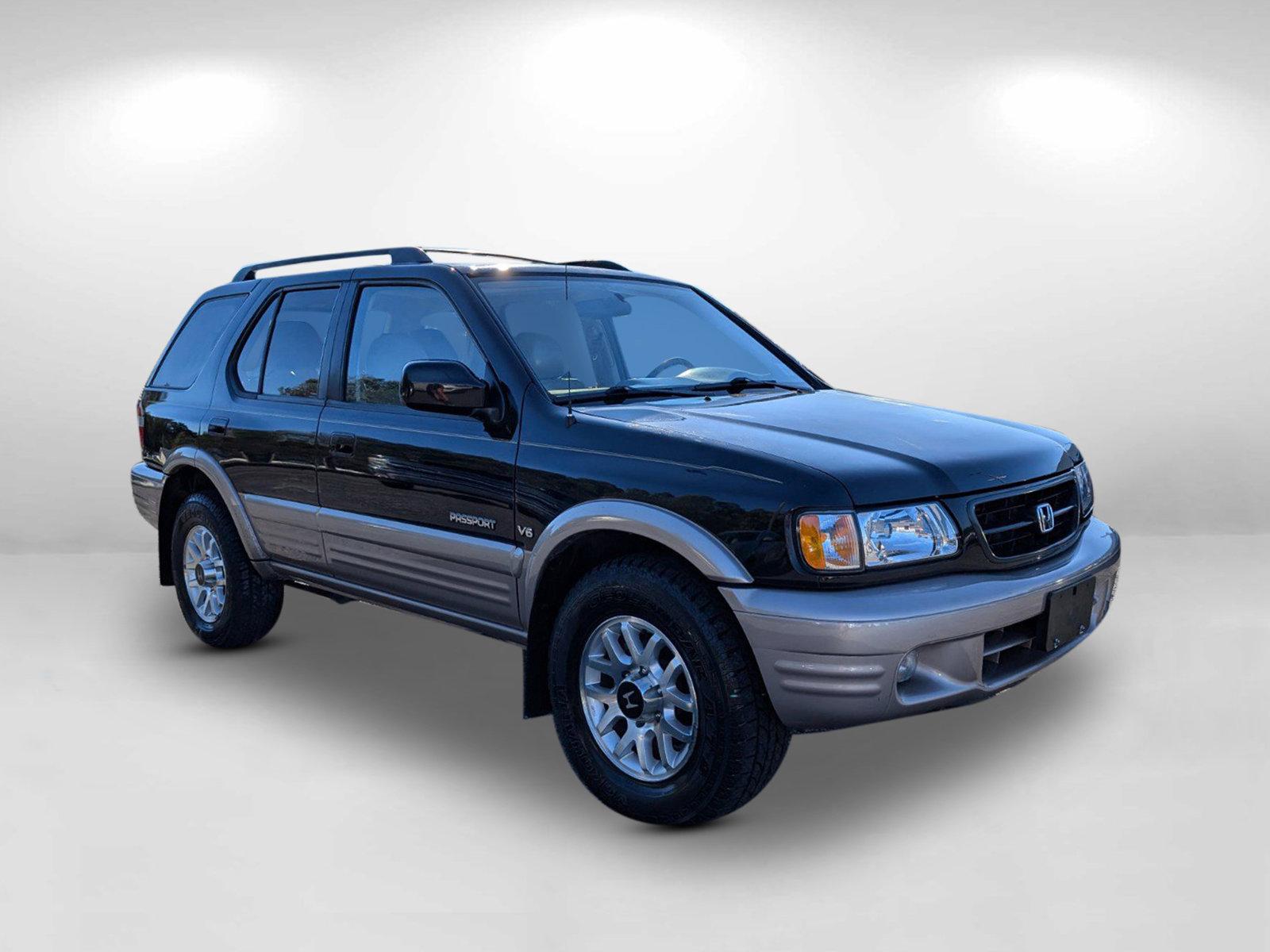 2000 Honda Passport EX (4S6CK58W3Y4) with an Gas V6 3.2L/193 engine, 4-Speed Electronic Automatic w/OD transmission, located at 3959 U.S. 80 W, Phenix City, AL, 36870, (334) 297-4885, 32.469296, -85.135185 - 2000 Honda Passport EX - Photo#2