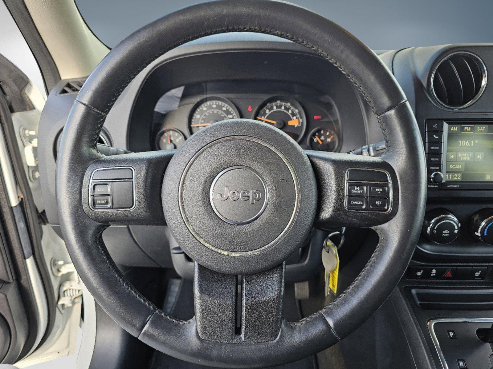 2016 Bright White Clearcoat /Dark Slate Gray Jeep Patriot High Altitude Edition (1C4NJPFA9GD) with an Regular Unleaded I-4 2.0 L/122 engine, 1-Speed CVT w/OD transmission, located at 5115 14th Ave., Columbus, GA, 31904, (706) 323-0345, 32.511494, -84.971046 - 2016 Jeep Patriot High Altitude Edition - Photo#9