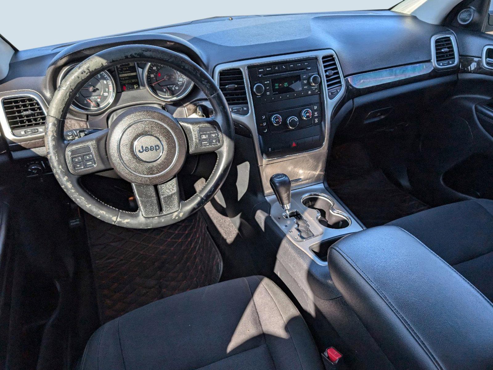 2011 /Black Interior Jeep Grand Cherokee Laredo (1J4RS4GGXBC) with an Gas/Ethanol V6 3.6L/220 engine, 5-Speed Automatic transmission, located at 521 Old Farm Lane Rd, Prattville, AL, 36066, (334) 325-1505, 32.482460, -86.416367 - 2011 Jeep Grand Cherokee Laredo - Photo#10