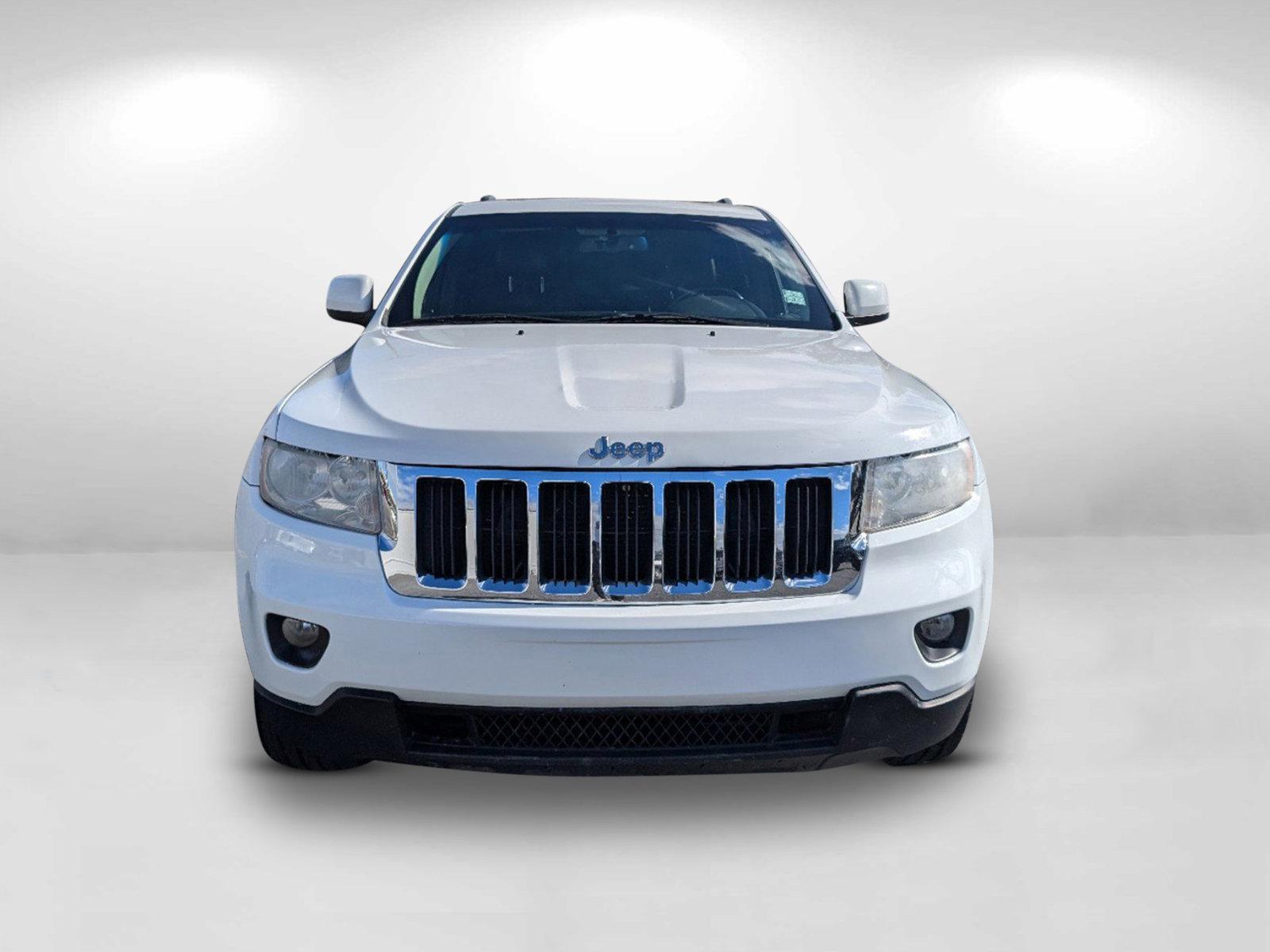 2013 /Black Jeep Grand Cherokee Laredo (1C4RJEAG9DC) with an Gas/Ethanol V6 3.6L/220 engine, 5-Speed Automatic transmission, located at 5115 14th Ave., Columbus, GA, 31904, (706) 323-0345, 32.511494, -84.971046 - 2013 Jeep Grand Cherokee Laredo - Photo#1