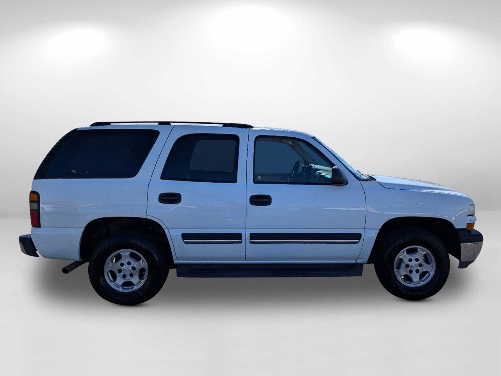 2005 Summit White /Tan/Neutral Chevrolet Tahoe LS (1GNEC13T65J) with an Gas V8 5.3L/327 engine, 4-Speed Automatic w/OD transmission, located at 3959 U.S. 80 W, Phenix City, AL, 36870, (334) 297-4885, 32.469296, -85.135185 - 2005 Chevrolet Tahoe LS - Photo#5