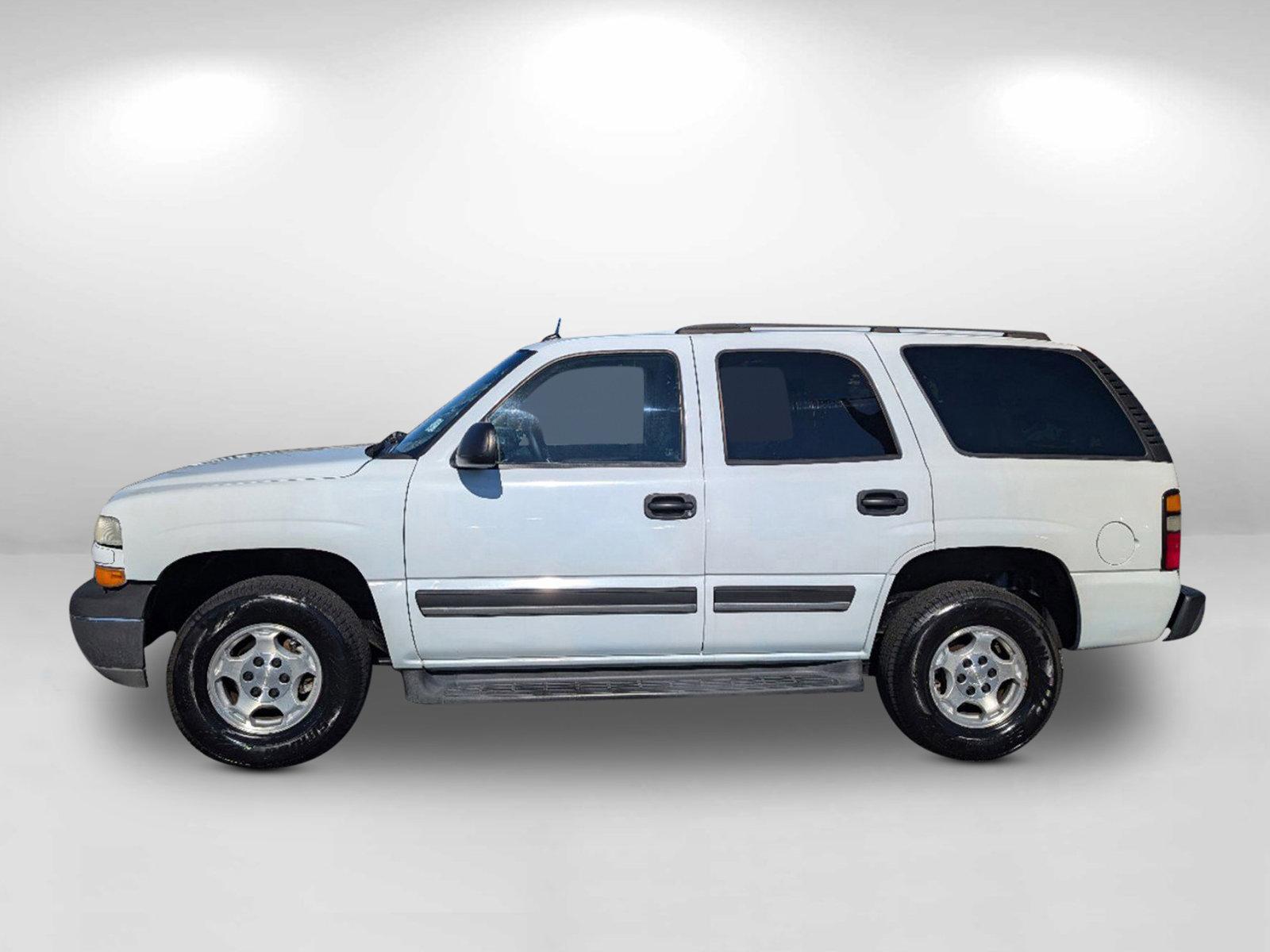 2005 Summit White /Tan/Neutral Chevrolet Tahoe LS (1GNEC13T65J) with an Gas V8 5.3L/327 engine, 4-Speed Automatic w/OD transmission, located at 3959 U.S. 80 W, Phenix City, AL, 36870, (334) 297-4885, 32.469296, -85.135185 - 2005 Chevrolet Tahoe LS - Photo#9