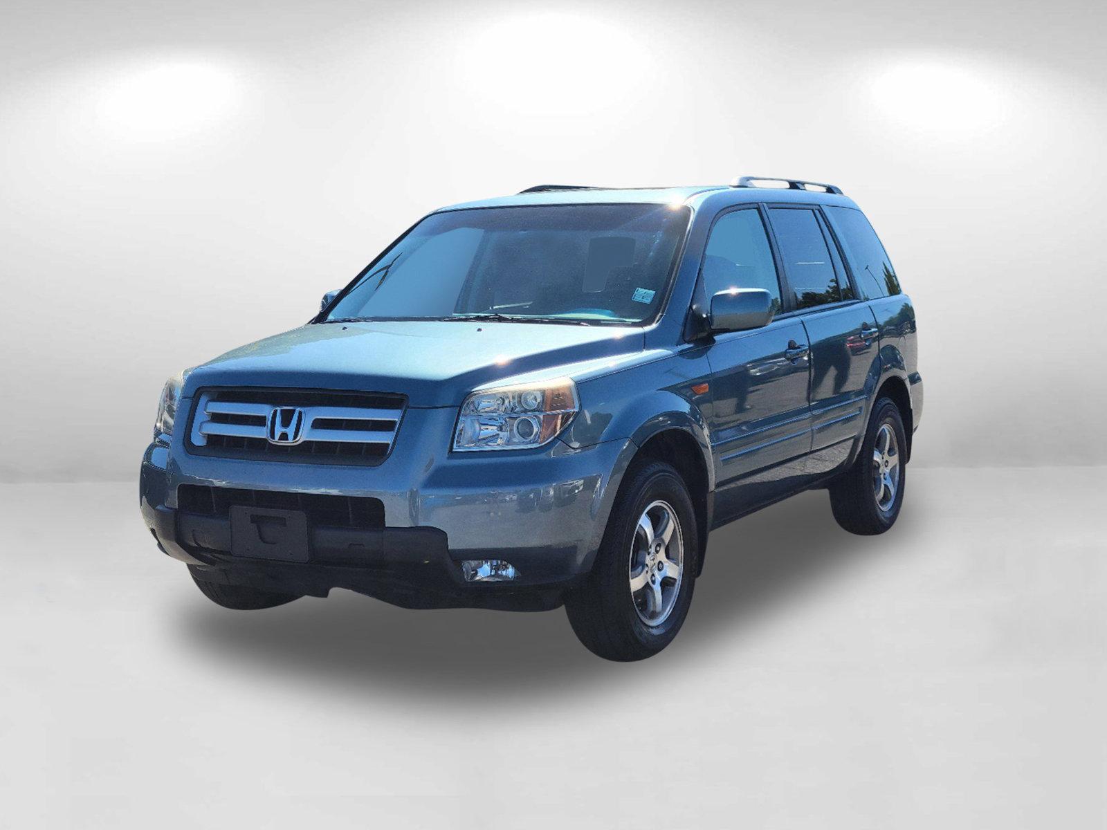 2006 Blue Honda Pilot EX-L (5FNYF28506B) with an Gas V6 3.5L/212 engine, 5-Speed Automatic w/OD transmission, located at 7000 Northlake Connector, Columbus, GA, 31904, (706) 987-8085, 32.524975, -84.978134 - 2006 Honda Pilot EX-L - Photo#16