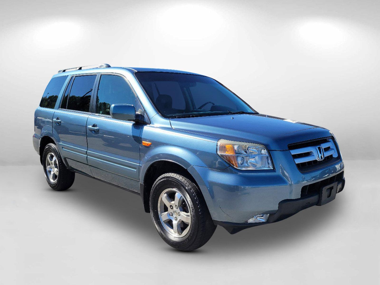 2006 Blue Honda Pilot EX-L (5FNYF28506B) with an Gas V6 3.5L/212 engine, 5-Speed Automatic w/OD transmission, located at 5115 14th Ave., Columbus, GA, 31904, (706) 323-0345, 32.511494, -84.971046 - 2006 Honda Pilot EX-L - Photo#2