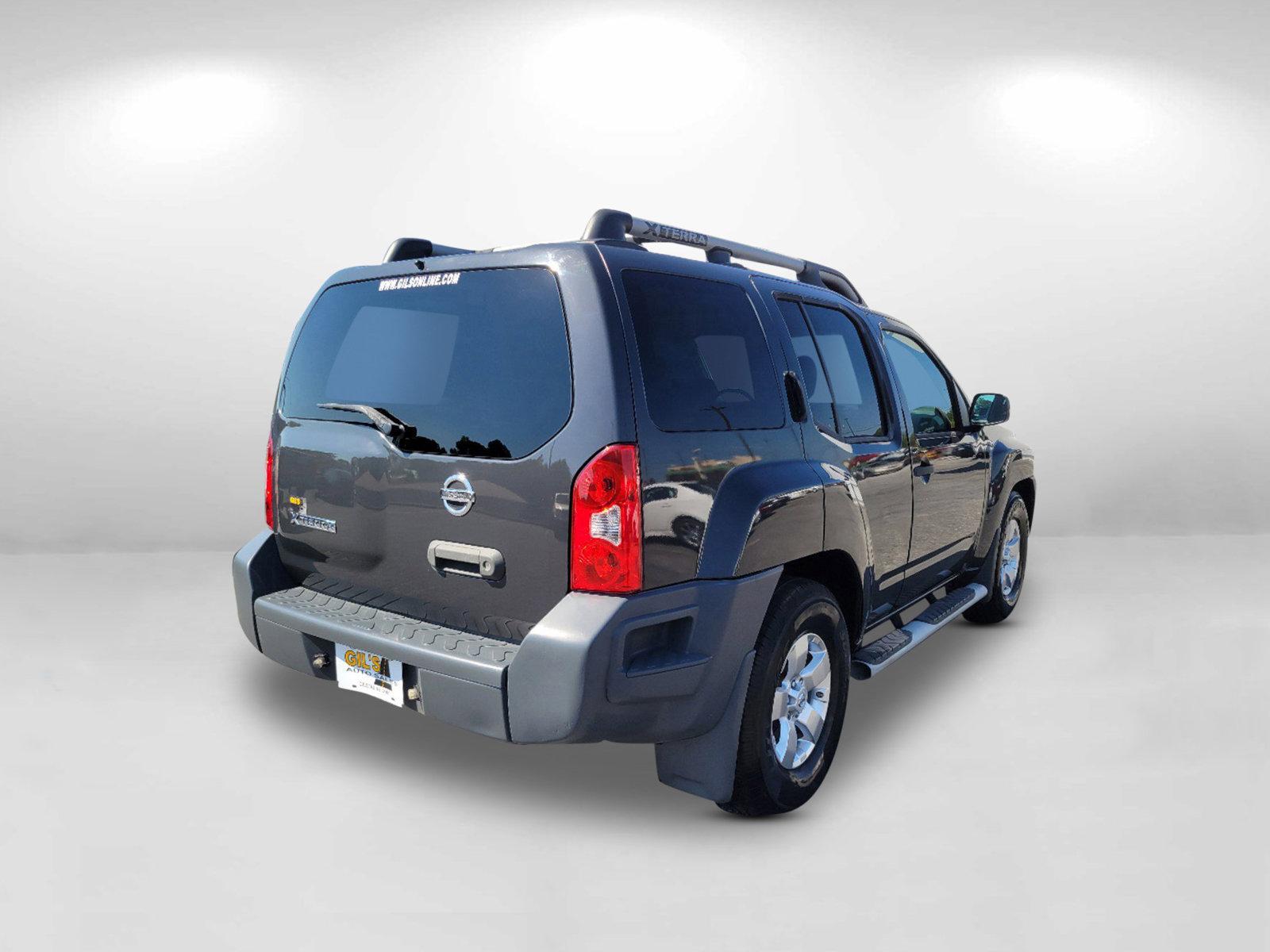 2010 Night Armor Pearl /Gray Nissan Xterra S (5N1AN0NU1AC) with an Gas V6 4.0L/ engine, 5-Speed Automatic w/OD transmission, located at 1430 Gateway Drive, Opelika, AL, 36801, (334) 239-0944, 32.637871, -85.409790 - 2010 Nissan Xterra S - Photo#4