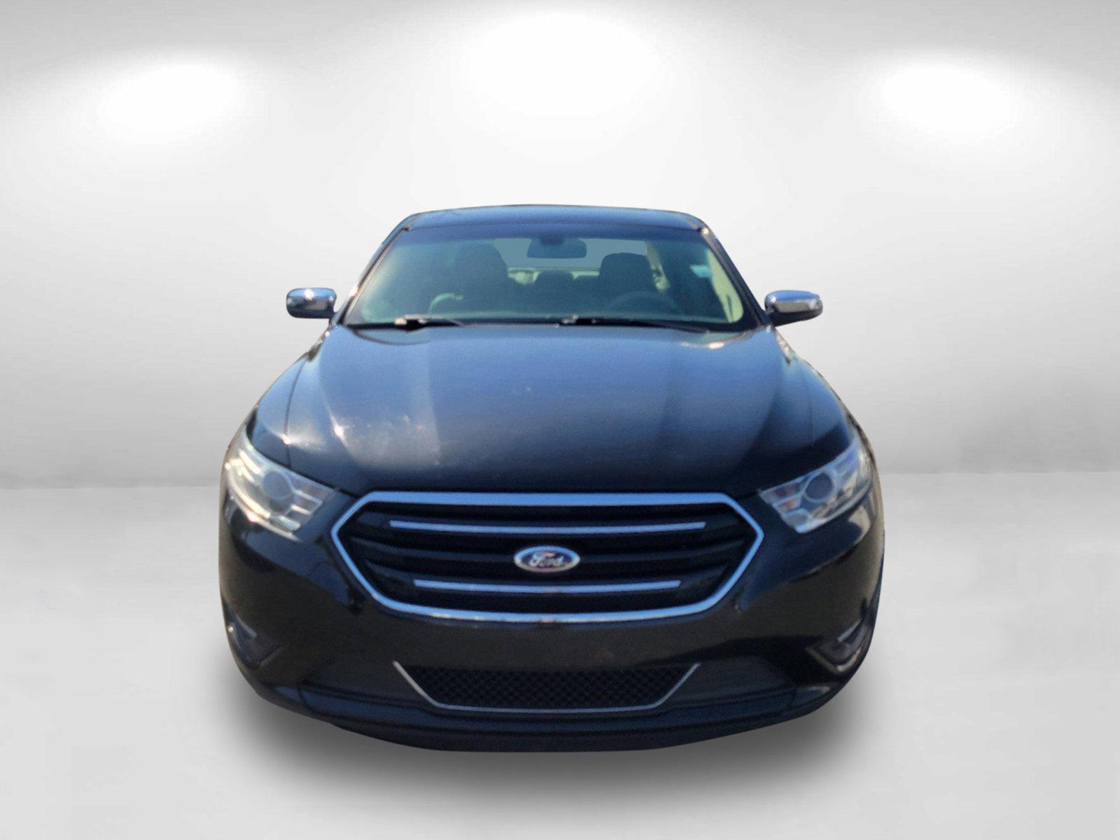 2014 Black Ford Taurus Limited (1FAHP2F81EG) with an Regular Unleaded V-6 3.5 L/213 engine, 6-Speed Automatic w/OD transmission, located at 5115 14th Ave., Columbus, GA, 31904, (706) 323-0345, 32.511494, -84.971046 - 2014 Ford Taurus Limited - Photo#1