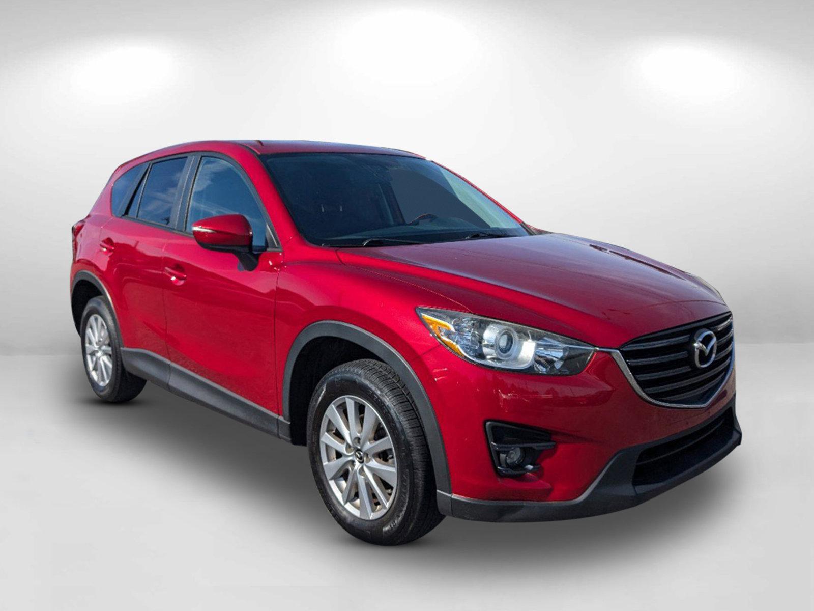 2016 /Black Mazda CX-5 Touring (JM3KE4CY2G0) with an Regular Unleaded I-4 2.5 L/152 engine, 6-Speed Automatic w/OD transmission, located at 804 22nd Ave, Phenix City, AL, 36870, (334) 297-1860, 32.484749, -85.024475 - 2016 Mazda CX-5 Touring - Photo#2